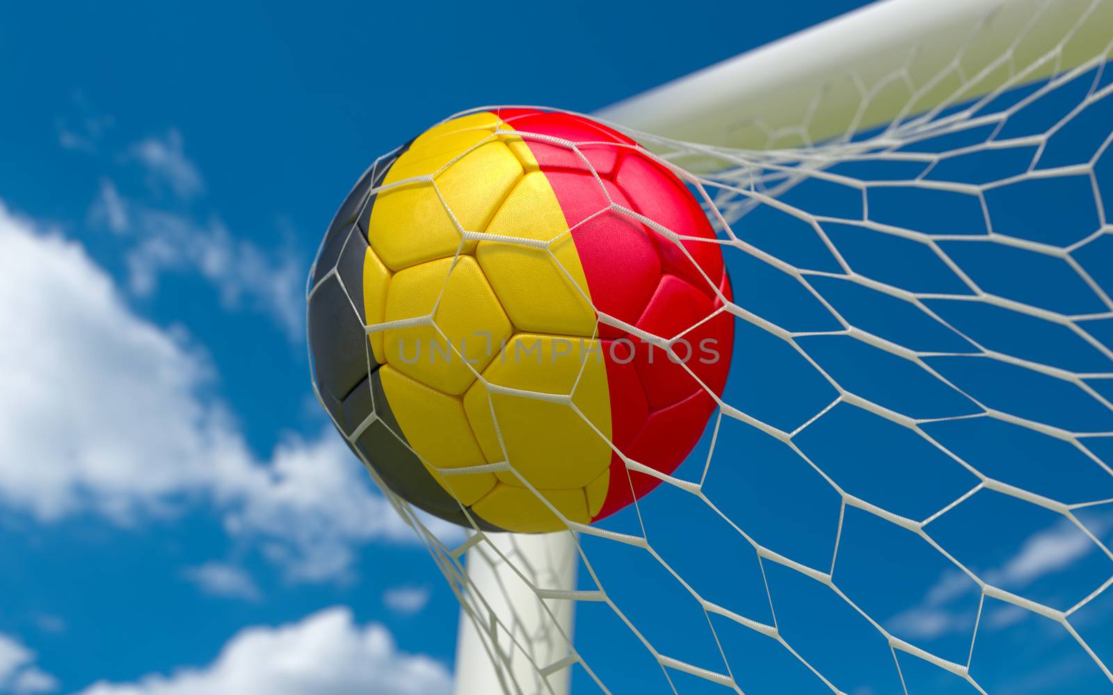 Belgium flag and soccer ball in goal net by Barbraford