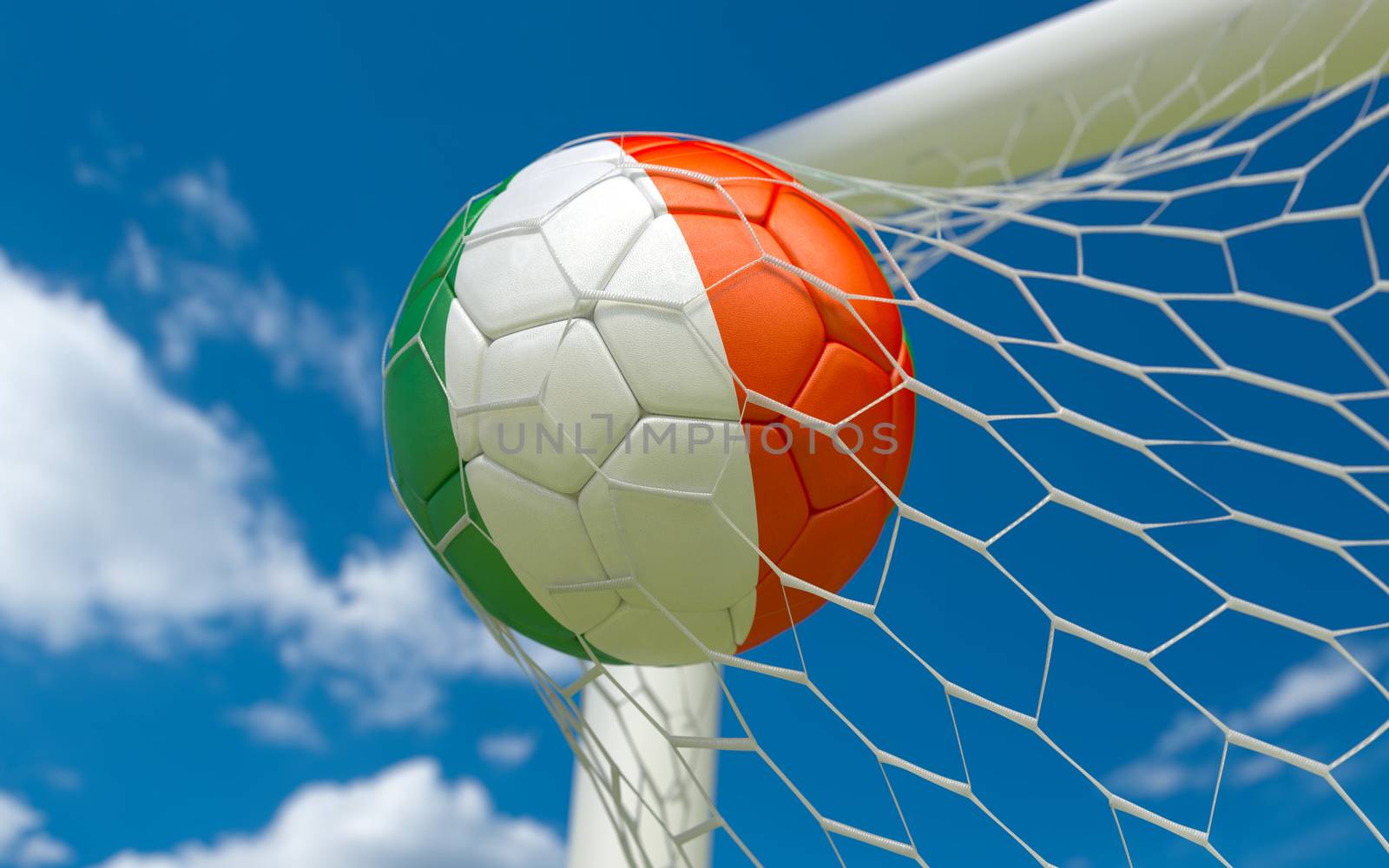 Flag of Ireland and soccer ball in goal net by Barbraford
