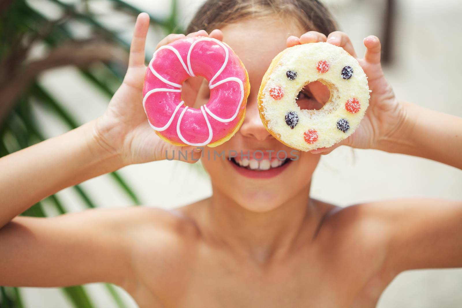 Girl eating donuts by alenkasm