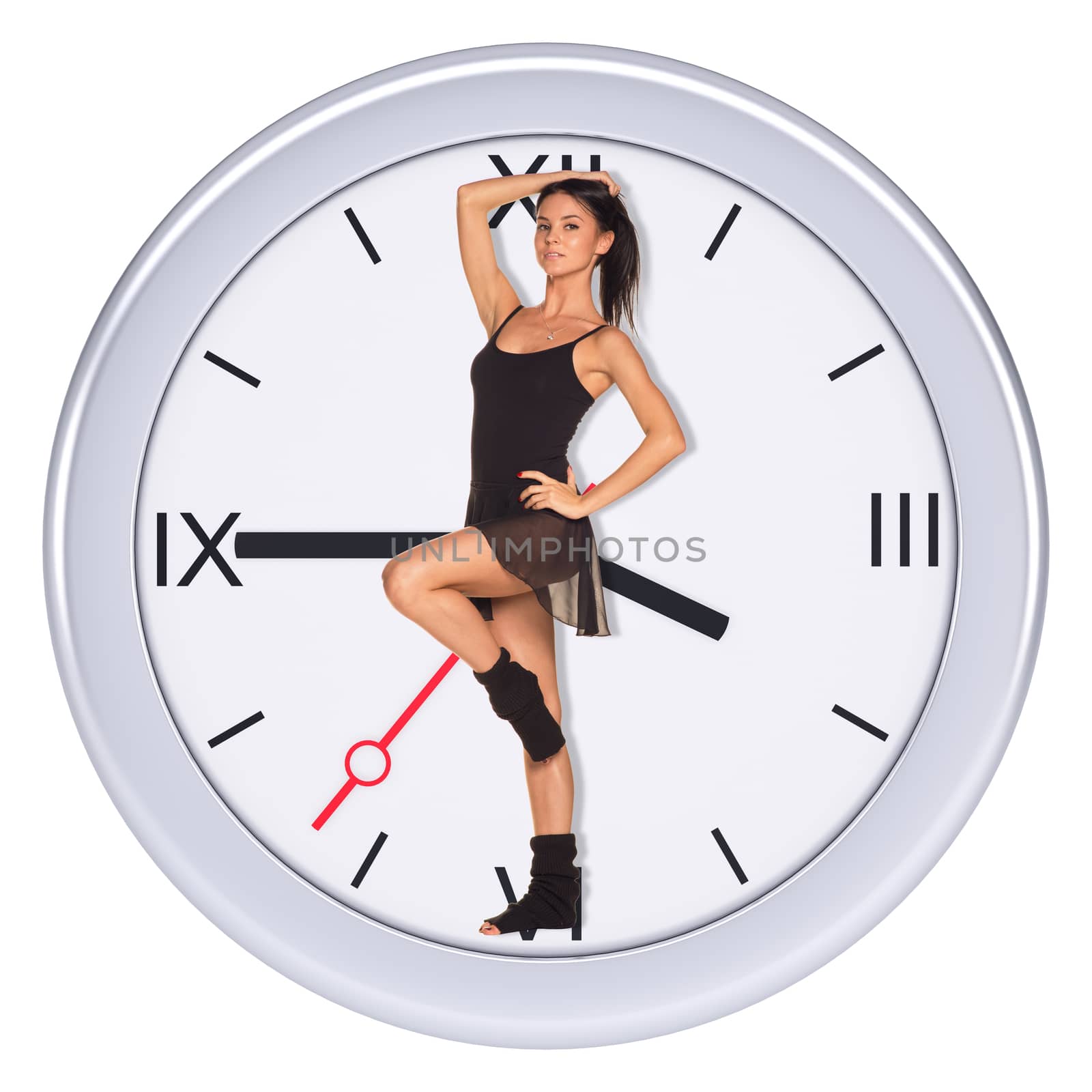 Young woman standing on one foot in center of clock on isolated white background