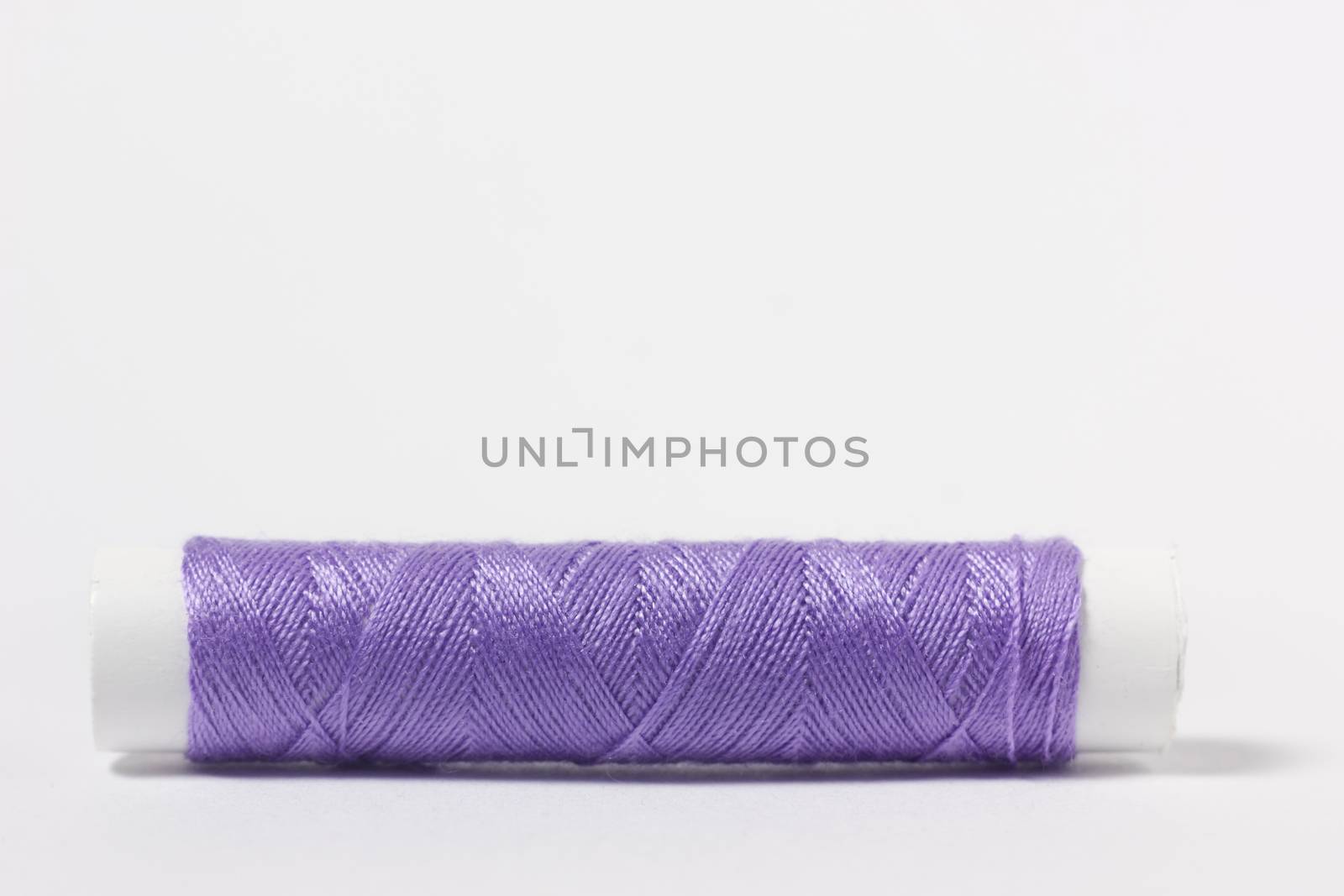 Cotton fabric purple on white background
