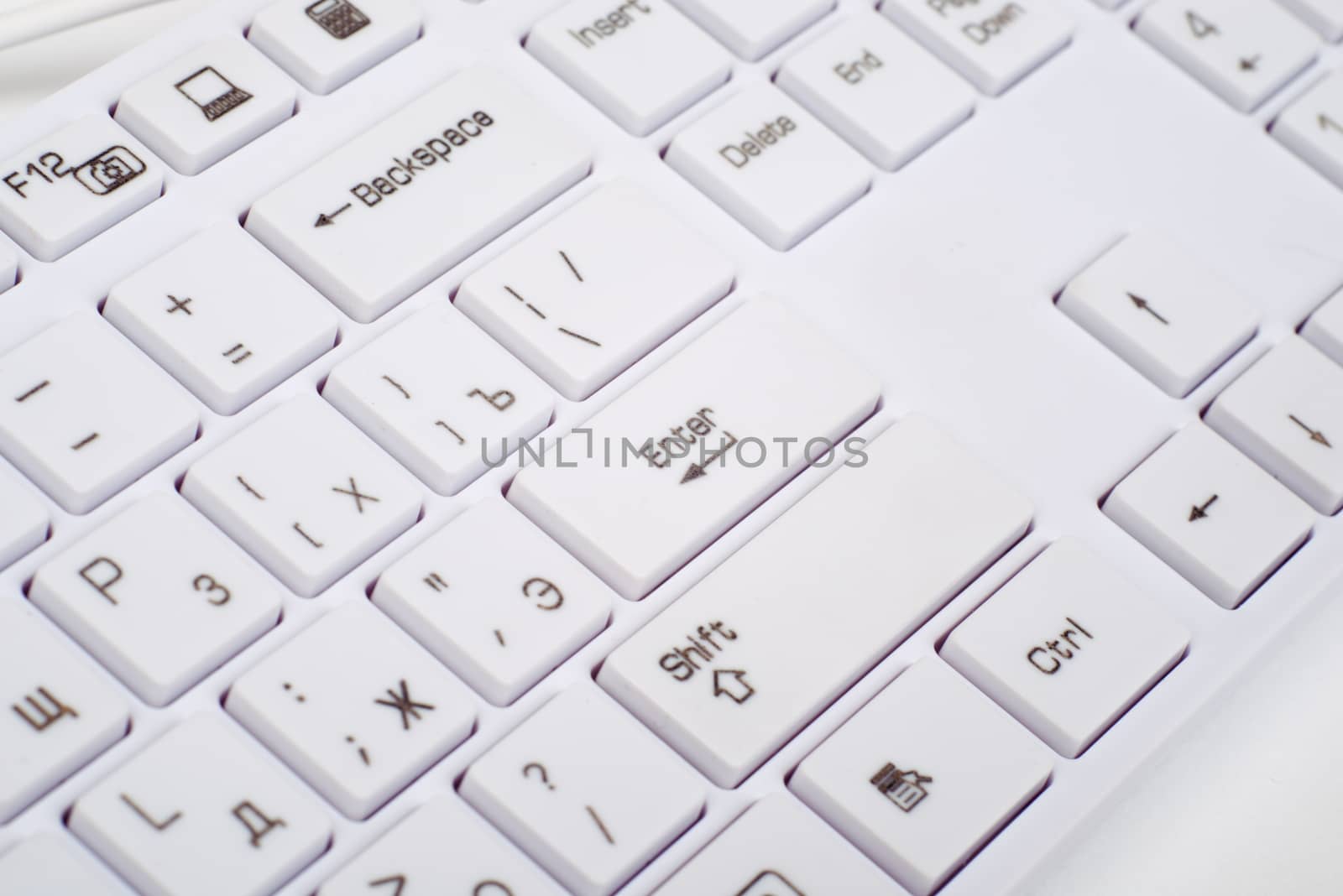 Computer keyboard on isolated white background, close up view