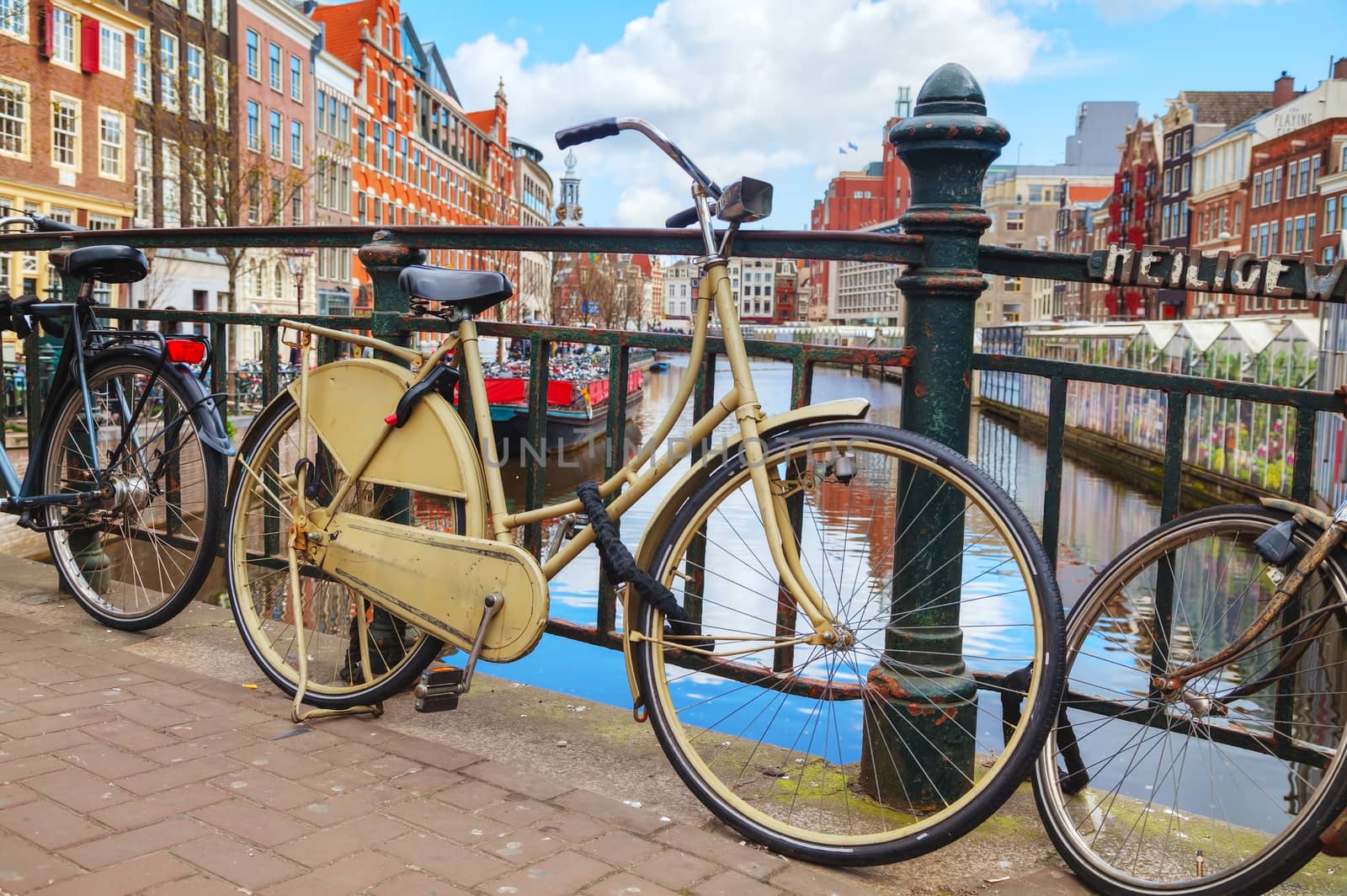 Bicycles parked near the floating flower market in Amsterdam, Netherlands