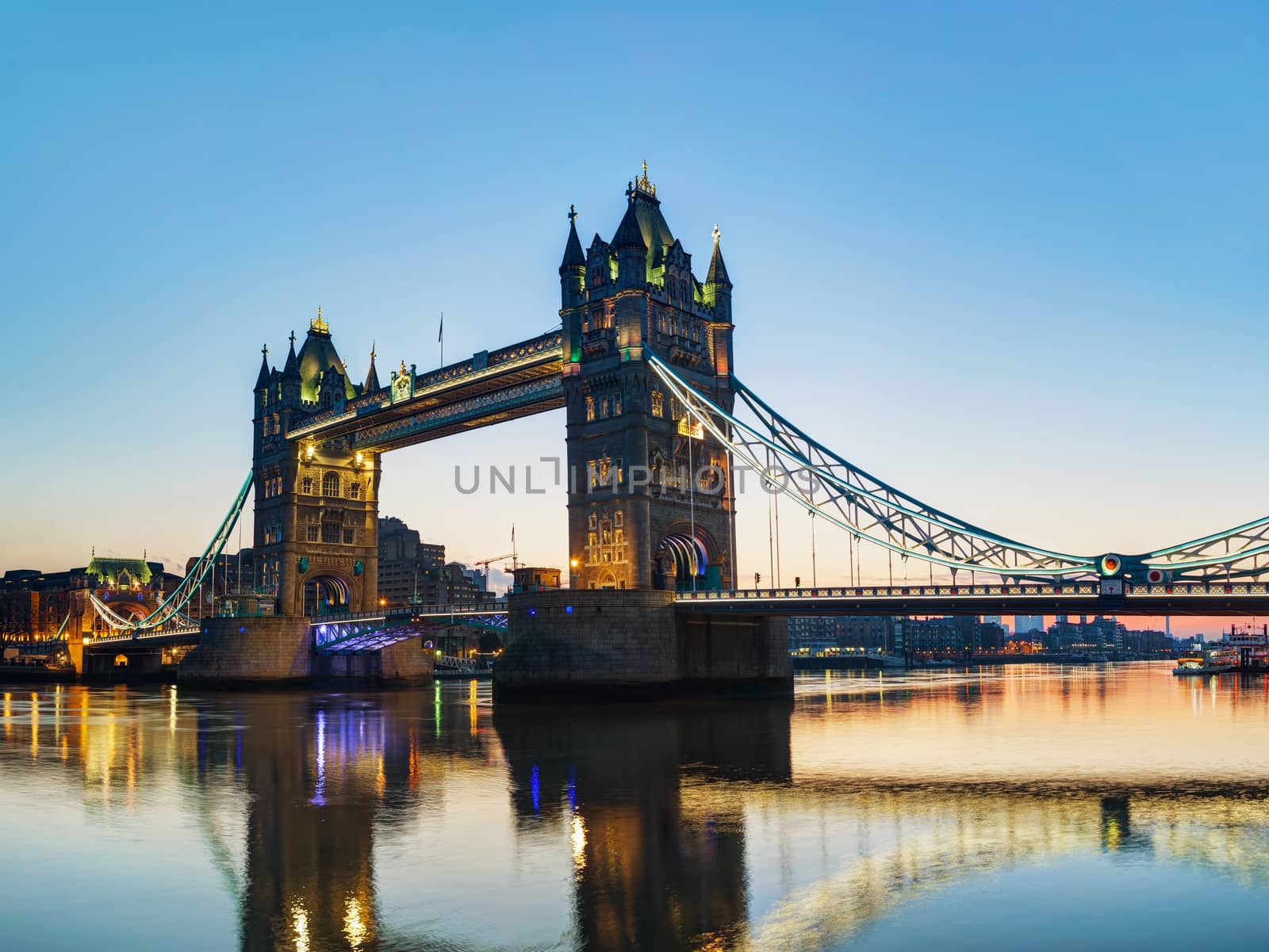 Tower bridge in London, Great Britain at sunrise by AndreyKr