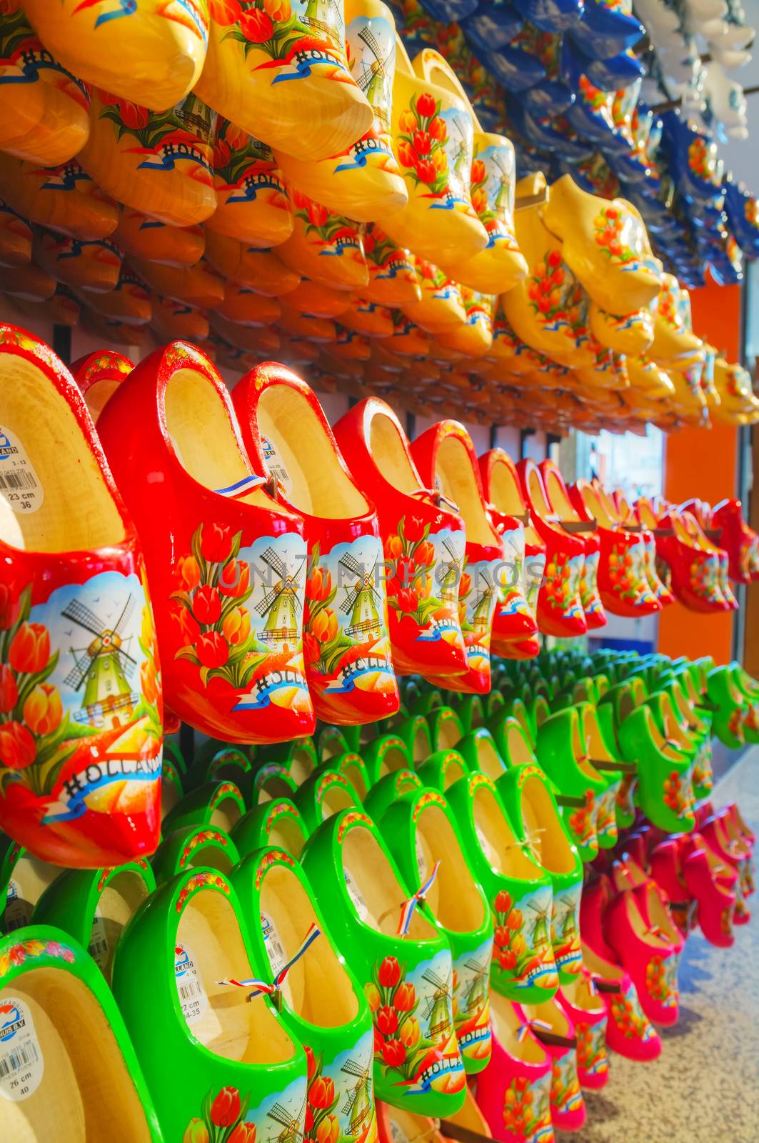 AMSTERDAM - APRIL 16: Colourful traditional Dutch wooden shoes (klomps) on April 16, 2015 in Amsterdam. Approximately 3 million pairs of klompen are made each year and sold throughout the Netherlands.