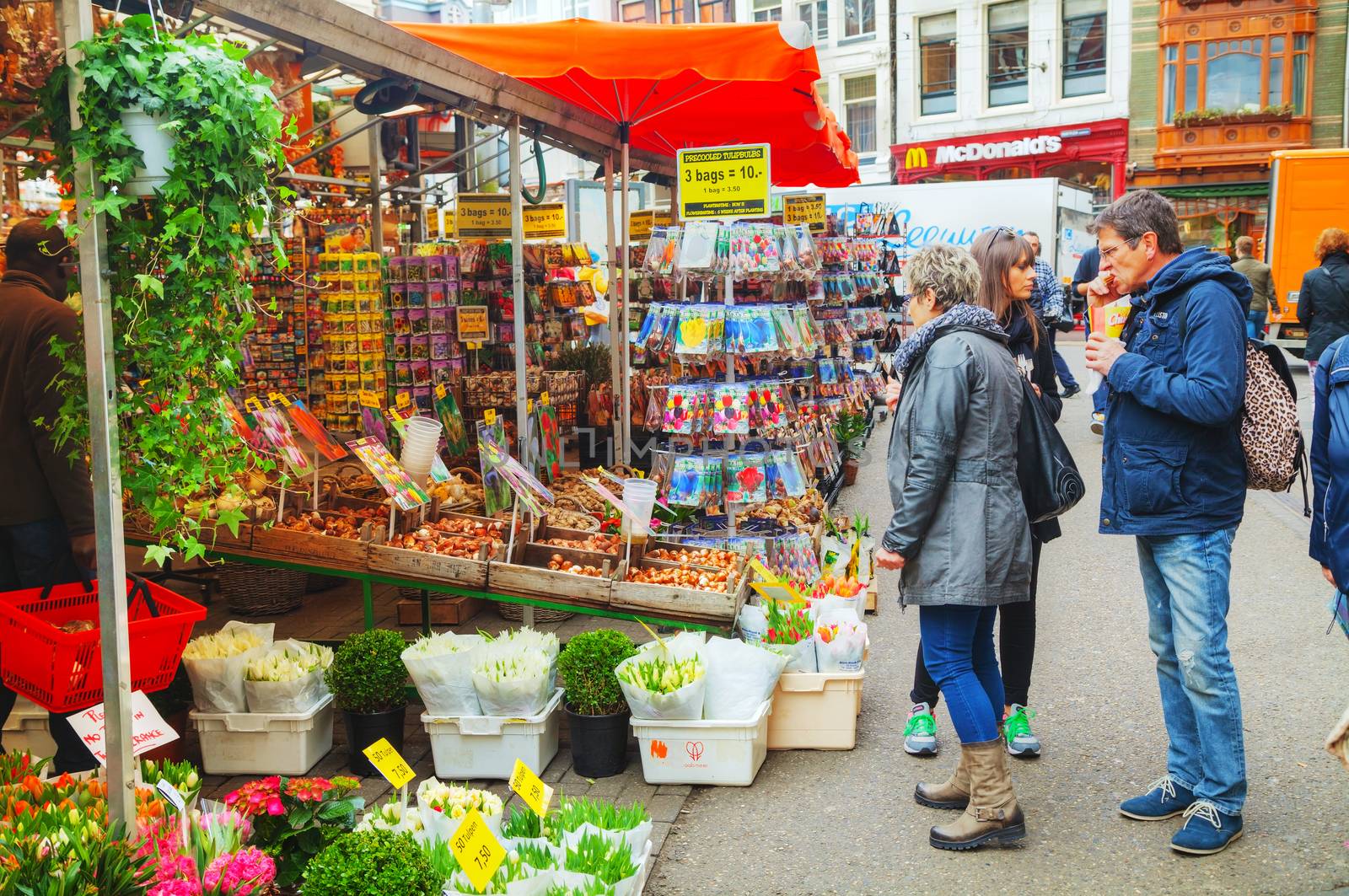 AMSTERDAM - APRIL 17: Floating flower market on April 17, 2015 in Amsterdam, Netherlands. It’s usually billed as the “world’s only floating flower market”.