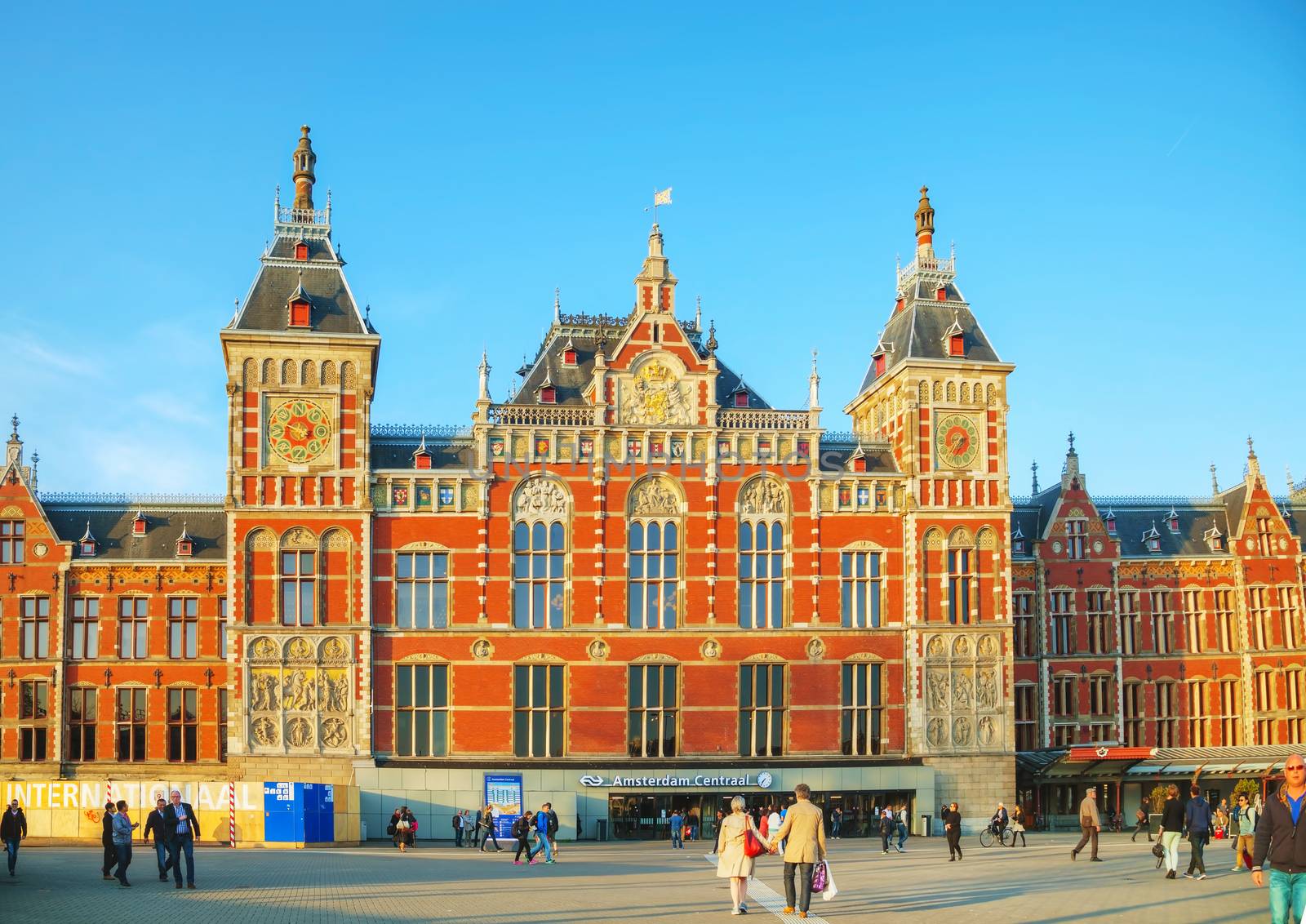 AMSTERDAM - APRIL 15: Amsterdam Centraal railway station on April 15, 2015 in Amsterdam, Netherlands. Amsterdam Centraal is the largest railway station of Amsterdam, and a major national railway hub.