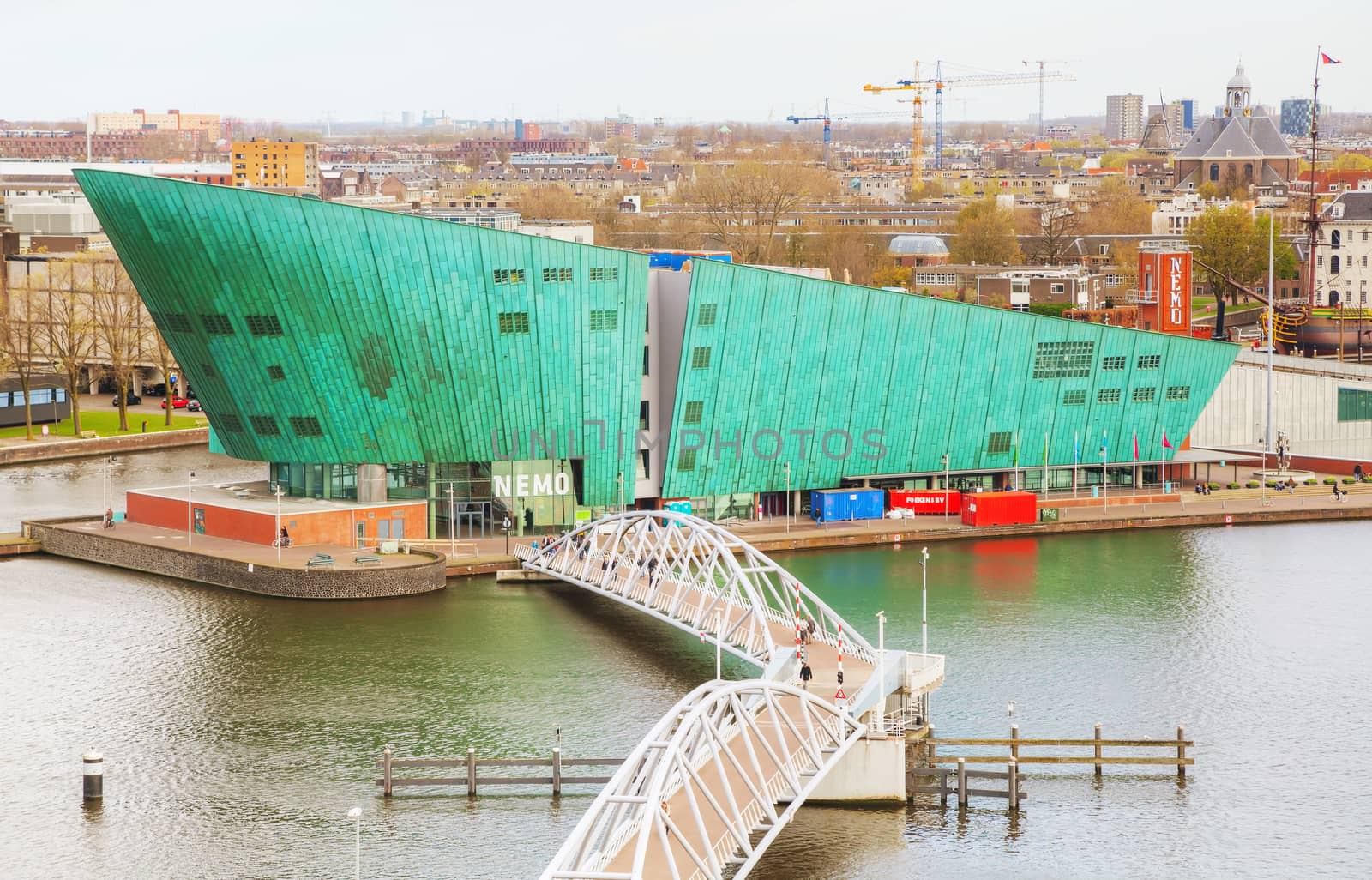 AMSTERDAM - APRIL 16: Science Center Nemo building on April 16, 2015 in Amsterdam, Netherlands. It contains five floors of hands-on science exhibitions and is the largest science center in the Netherlands.