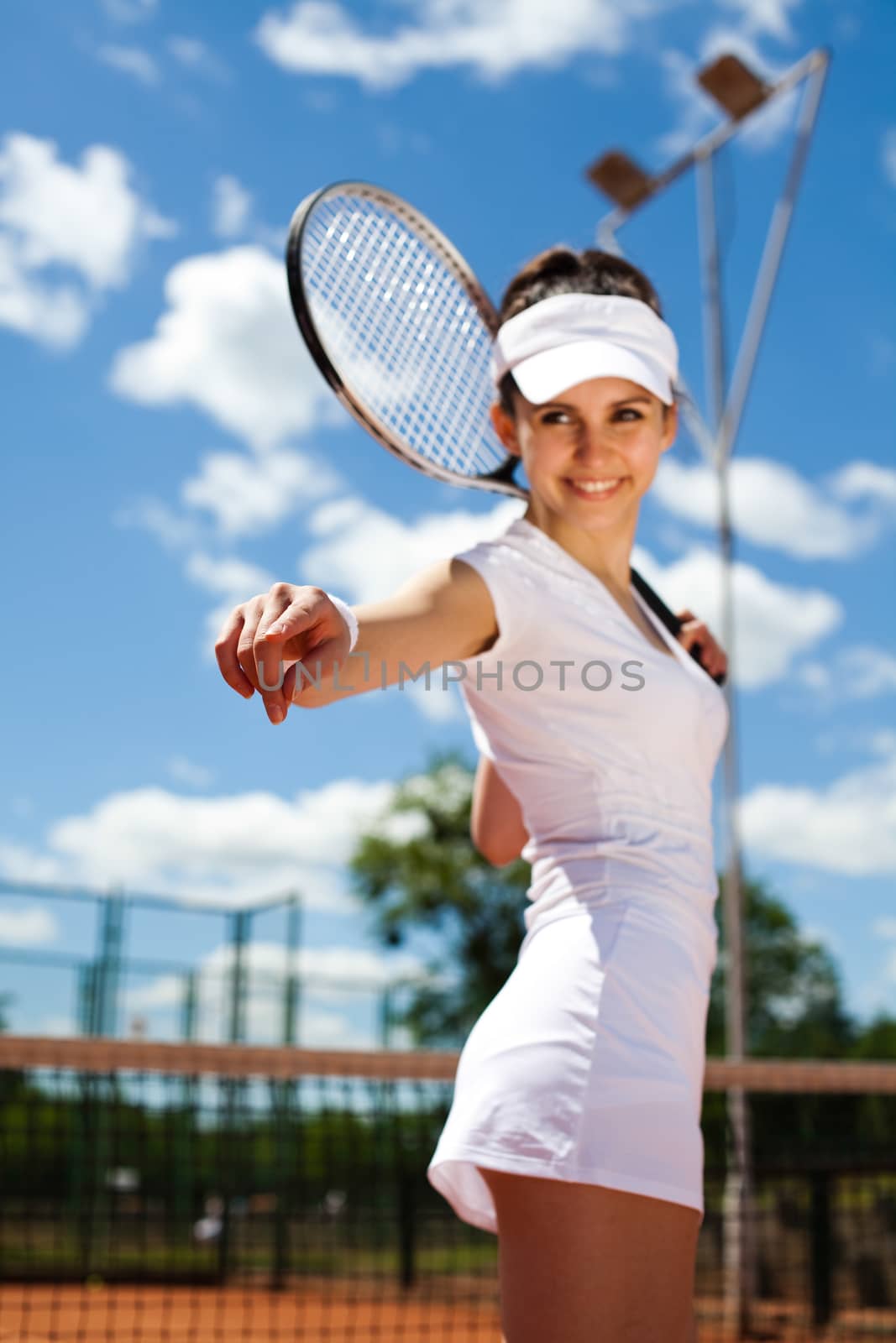 Playing tennis, summertime saturated theme