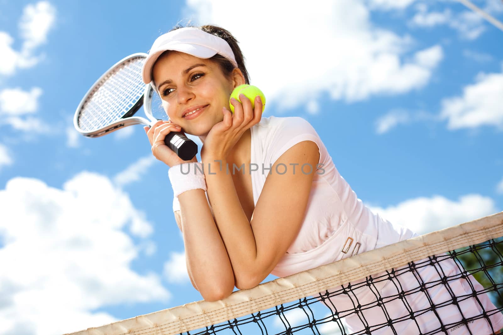 Playing tennis, summertime saturated theme