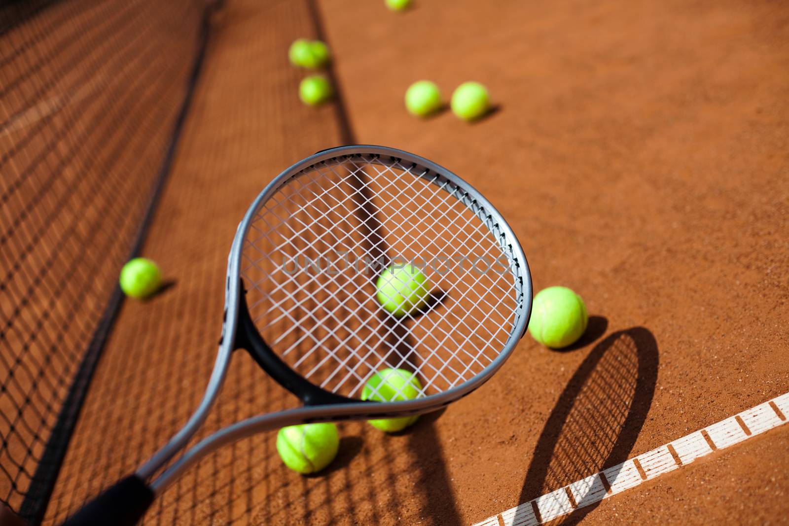 Tennis racket with tennis ball
