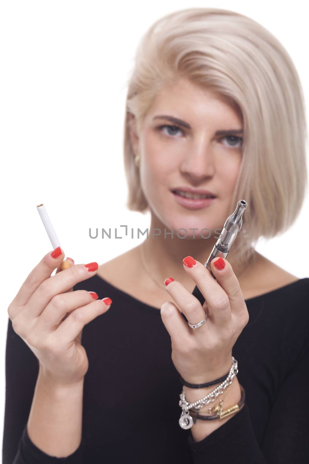 Close up Young Blond Woman in Black Clothing Holding a Tobacco and E-Cigarette on a White Background.