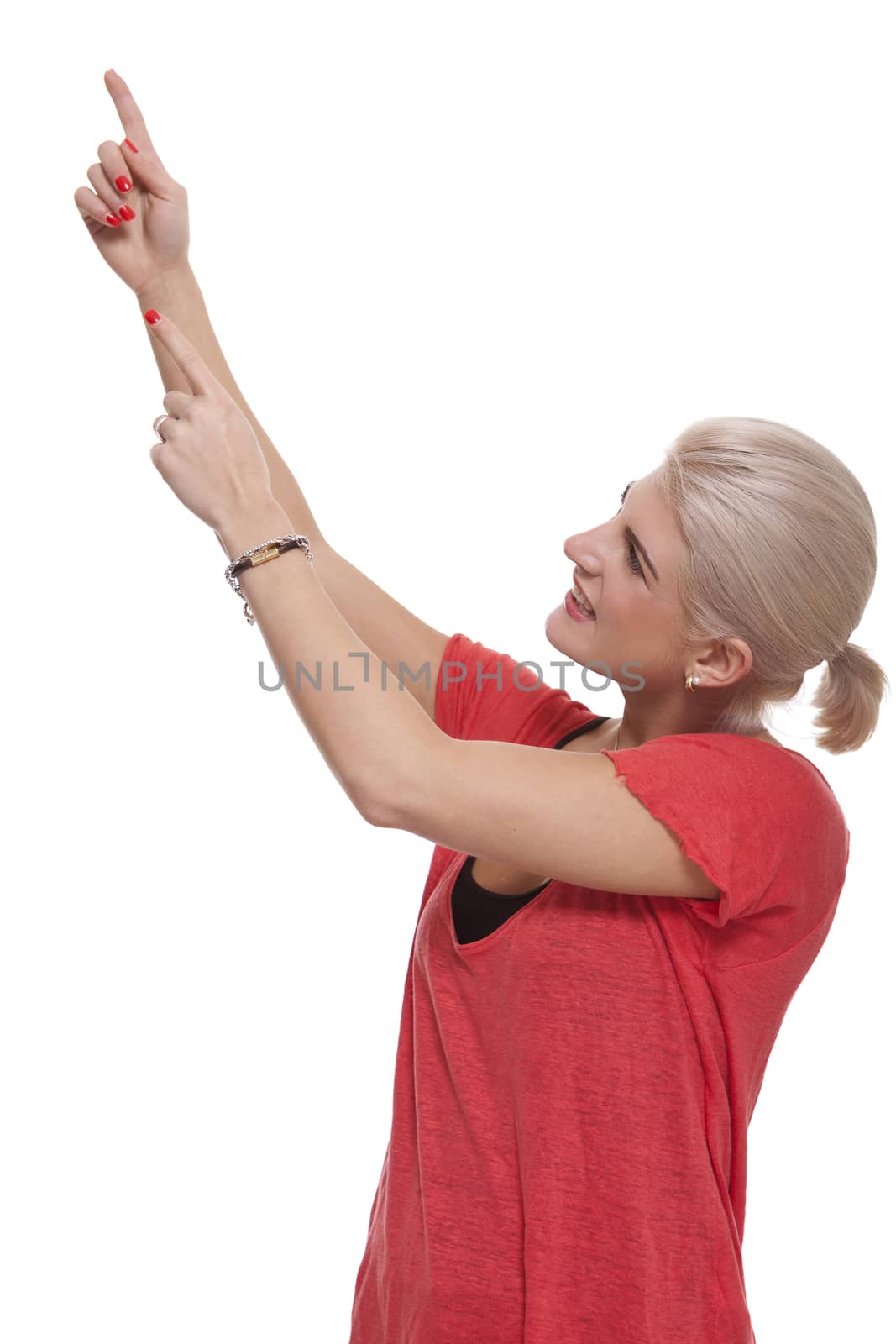 Close up Happy Young Blond Woman Pointing on Upper Right with Both her Hands. Isolated on White Background