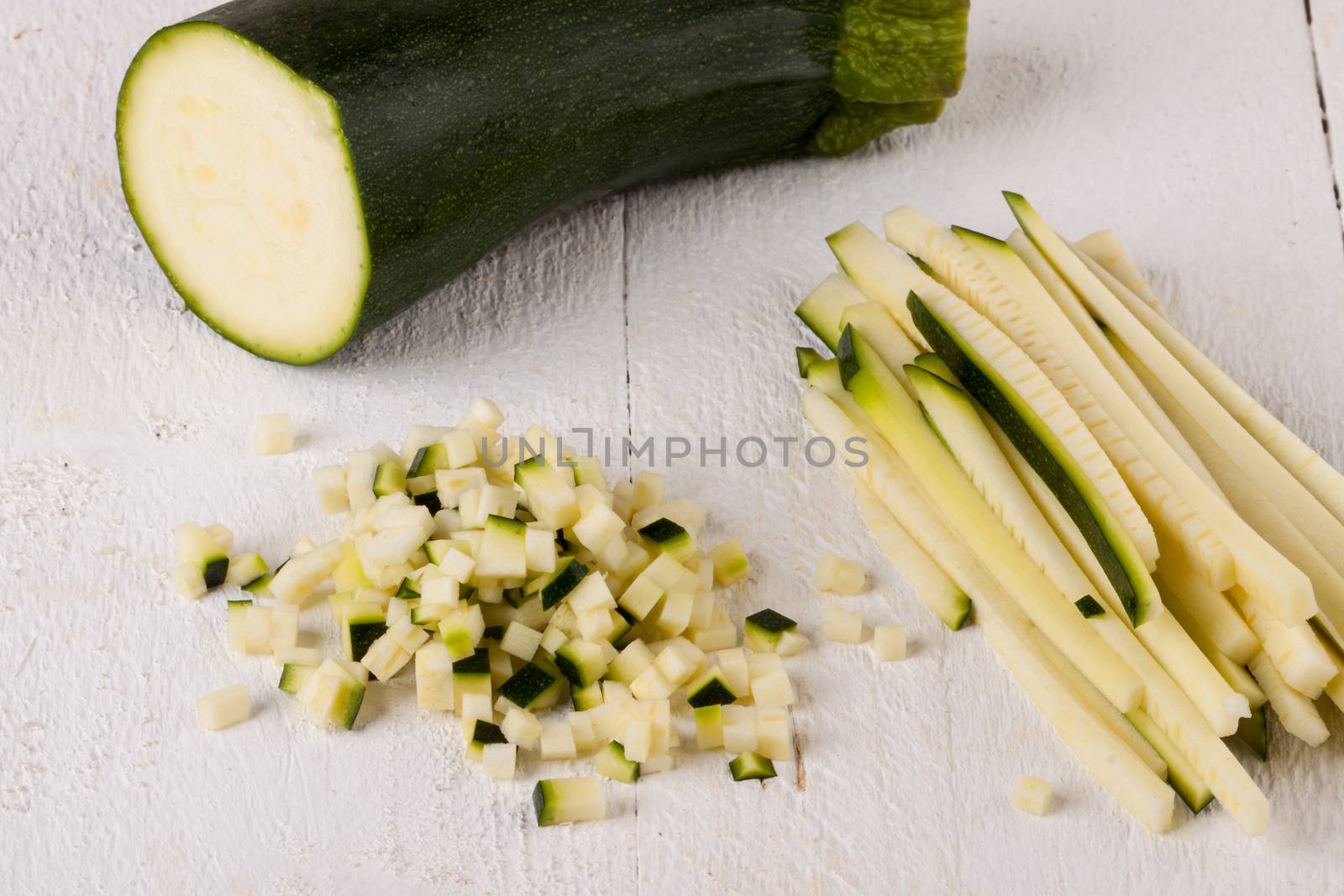 Fresh marrow or courgette cut into batons and diced into small cubes for use in salads and as a vegetable in cooking