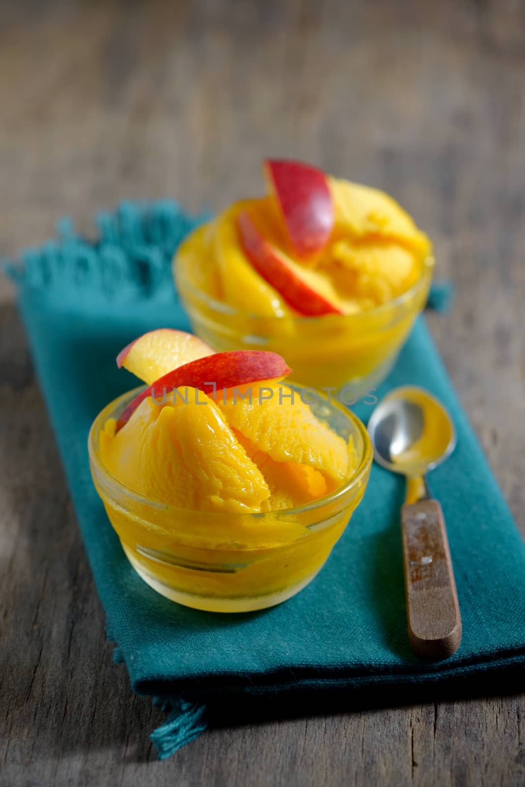 mango sorbet on old table wood