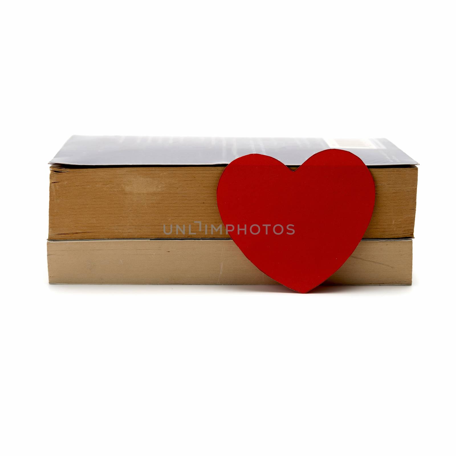 book and heart isolated on white background concept love to learning