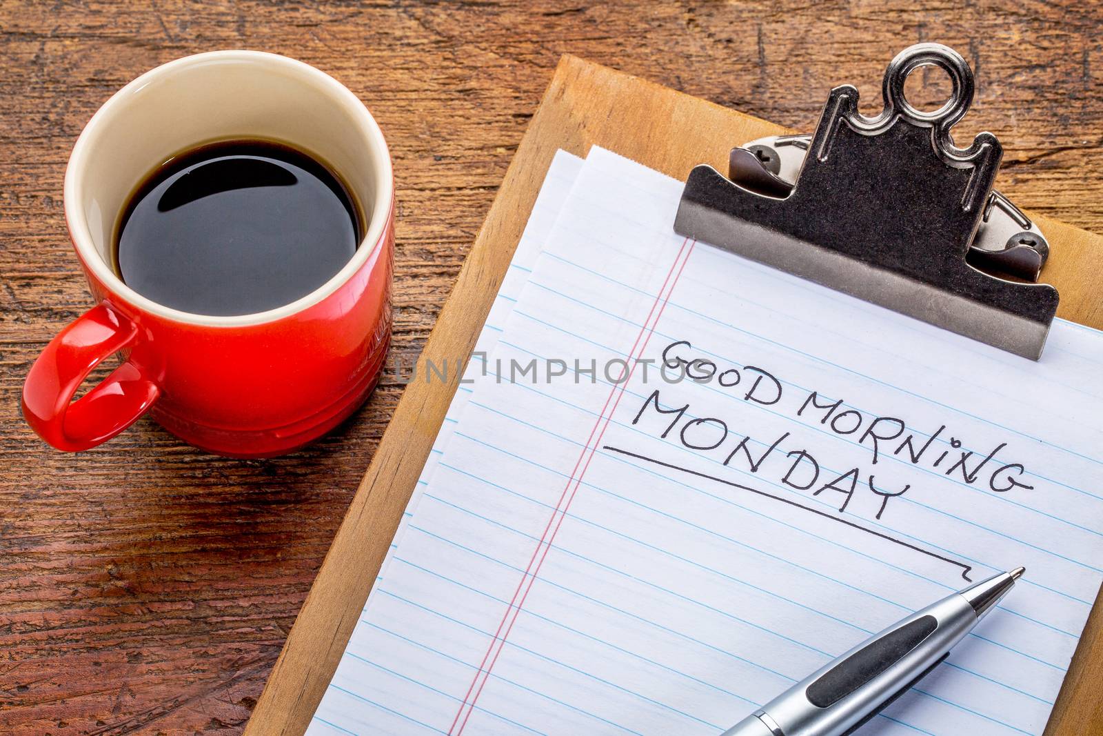 Good morning, Monday on clipboard by PixelsAway