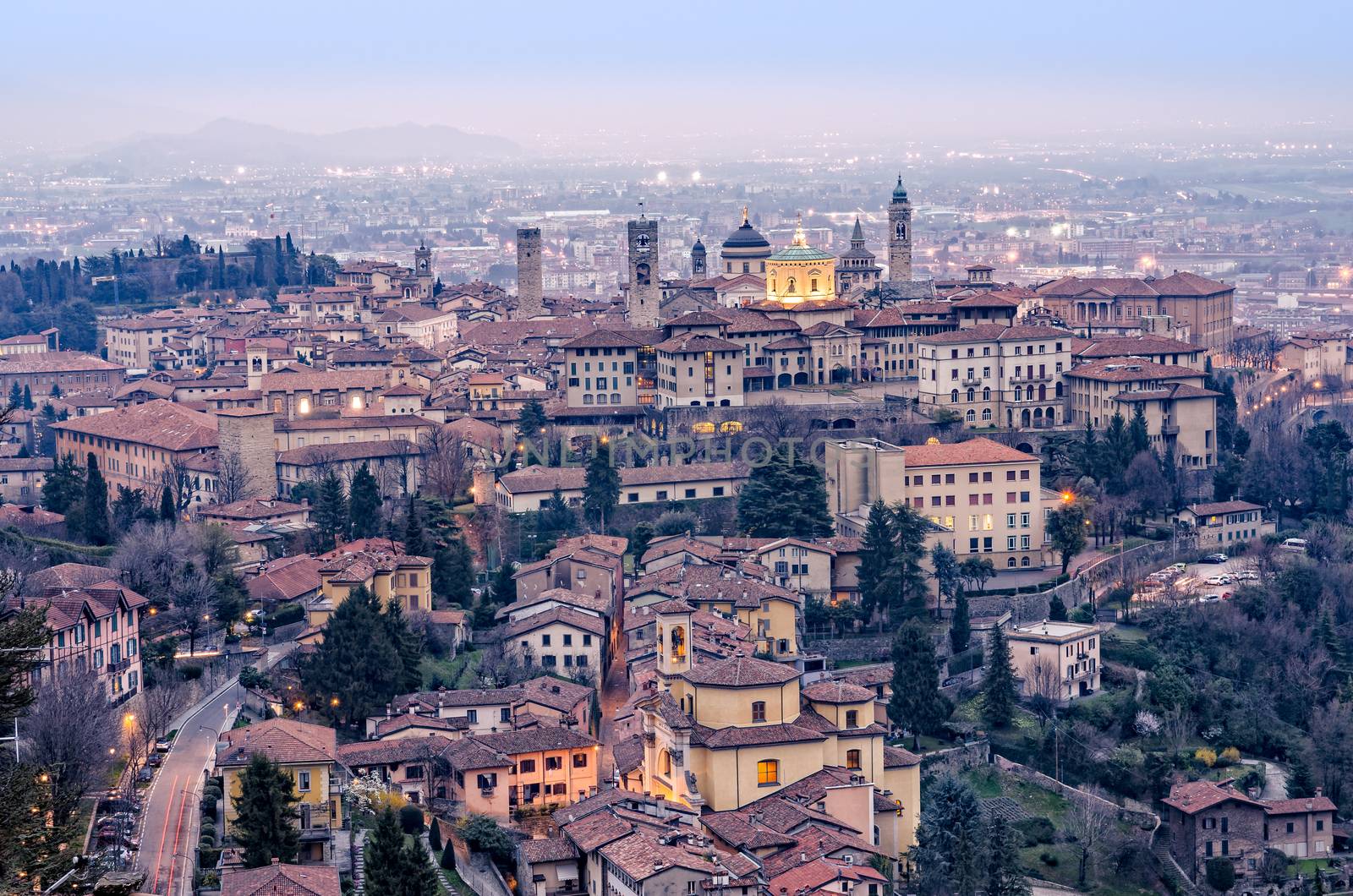 Scenic view of Bergamo old town cityscape after sunset, Italy, Europe