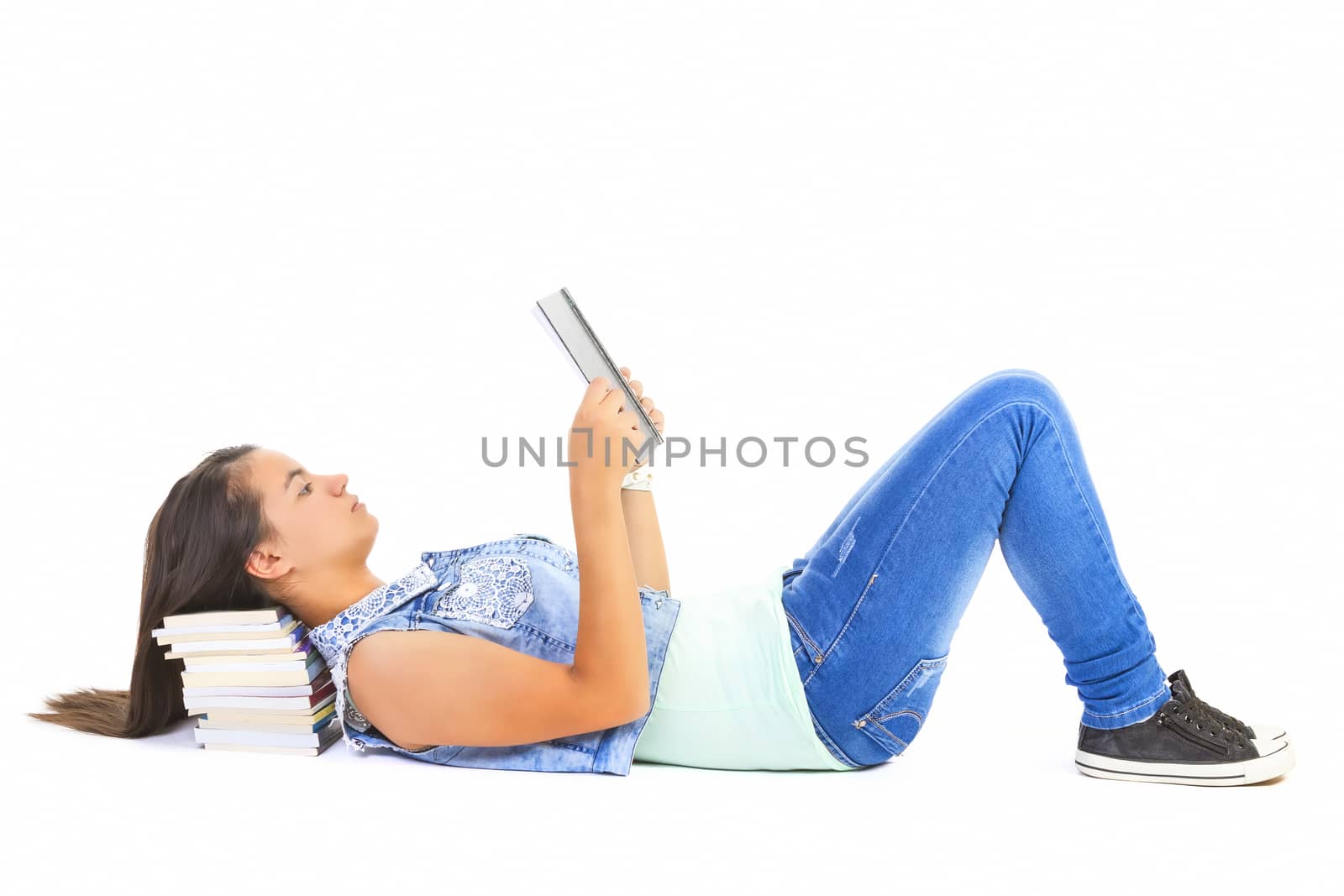 teenager girl reading book  by manaemedia