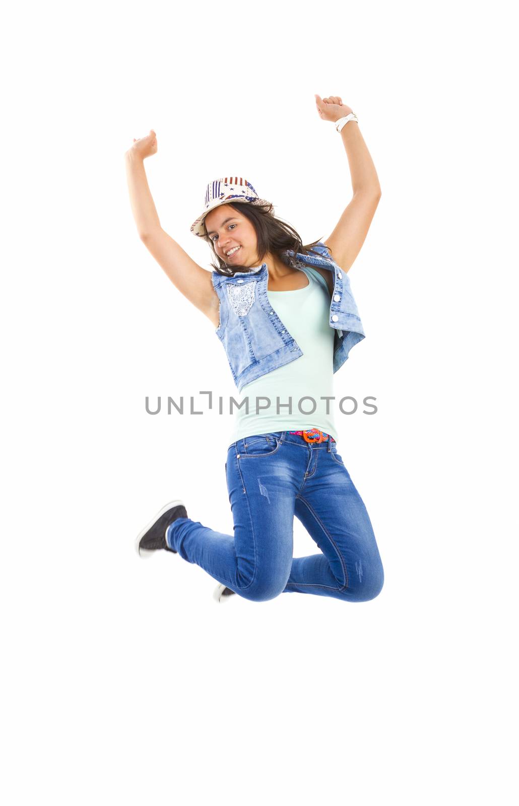 Beautiful teen girl jumping.