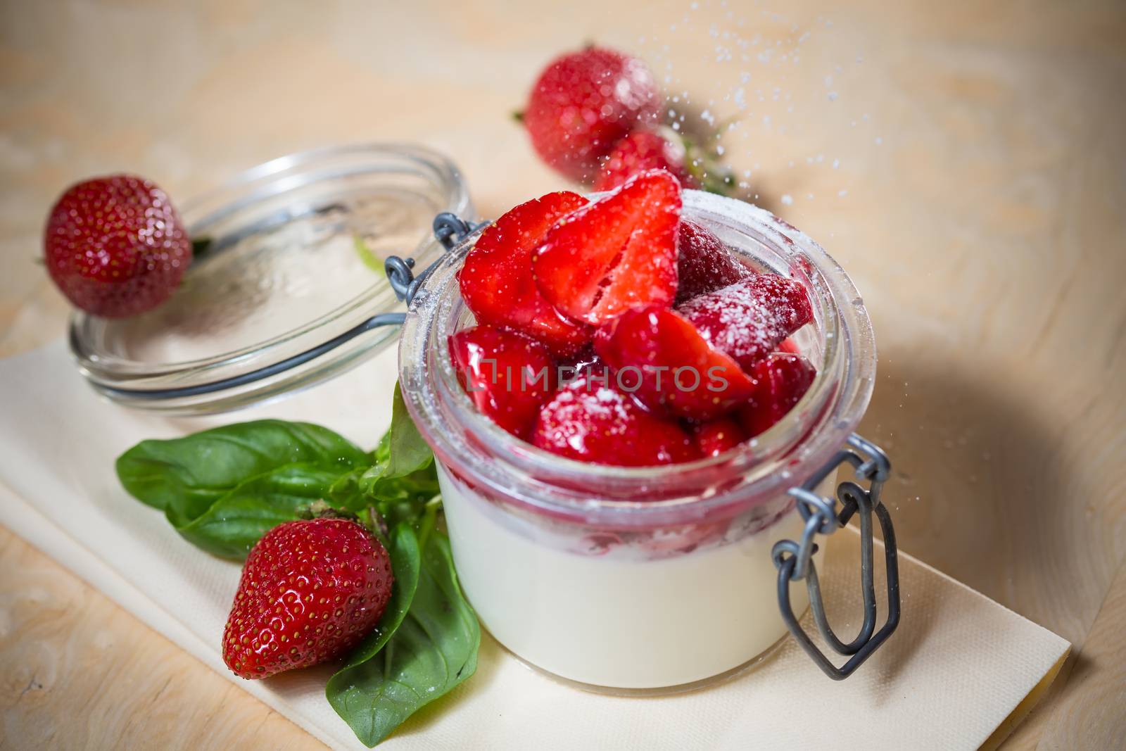 Strawberry tiramisu with mascarpone in glass. Close up