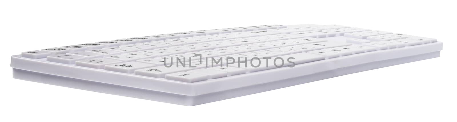 Computer keyboard on isolated white background, side view