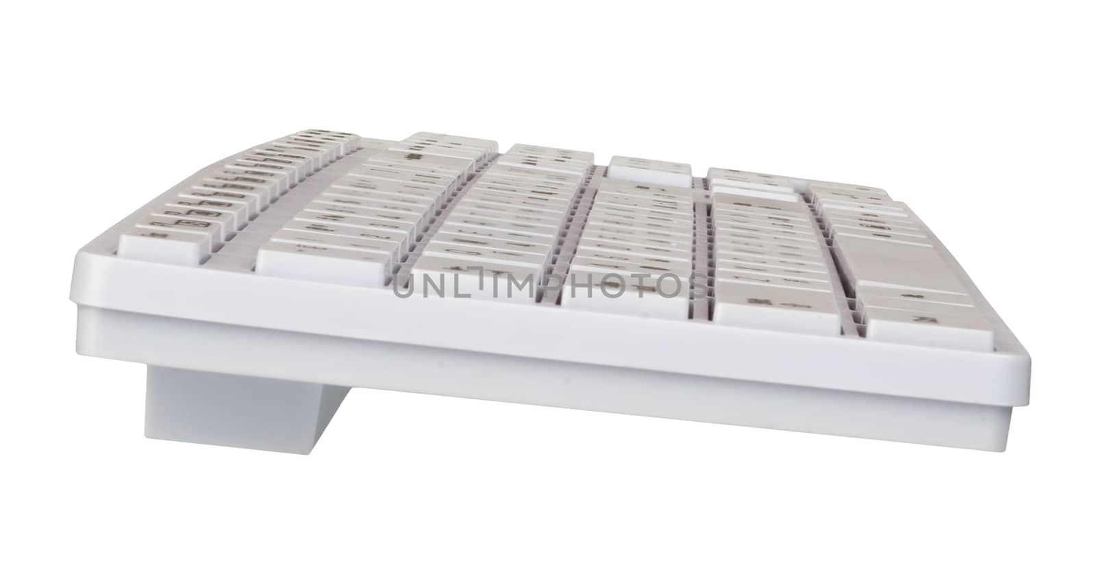 Keyboard on isolated white background, side view