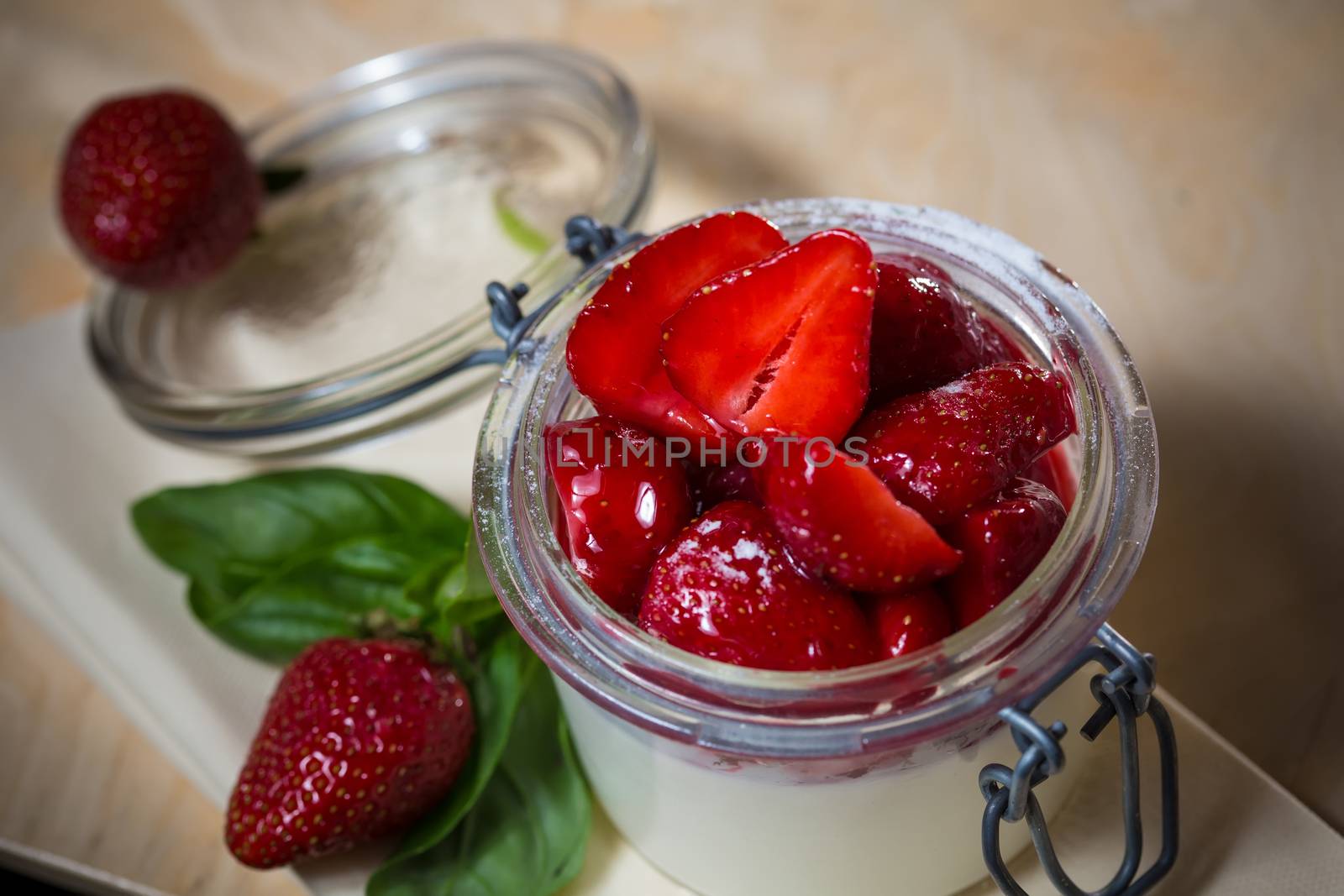 Strawberry tiramisu with mascarpone in glass. Close up