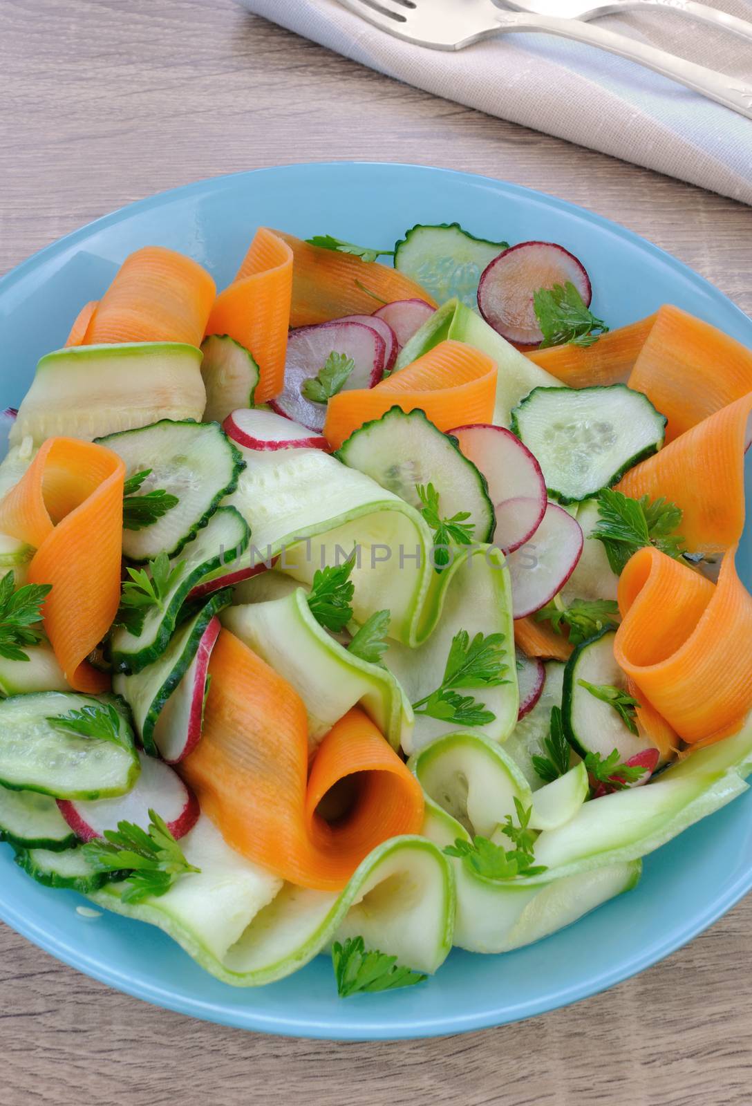 Salad   ribbon of carrot and zucchini with radish and cucumber