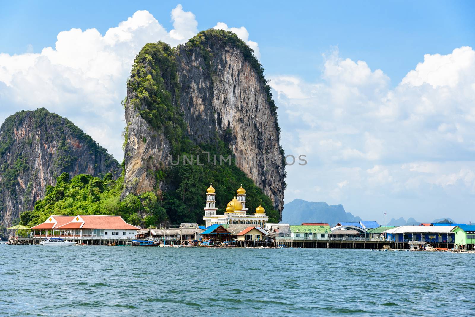 Beautiful landscape sea and blue sky in summer at Punyi Island or Koh Panyee is fisherman village cultural attractions travel by boat in Phang Nga Bay or Ao Phang Nga National Park, Thailand