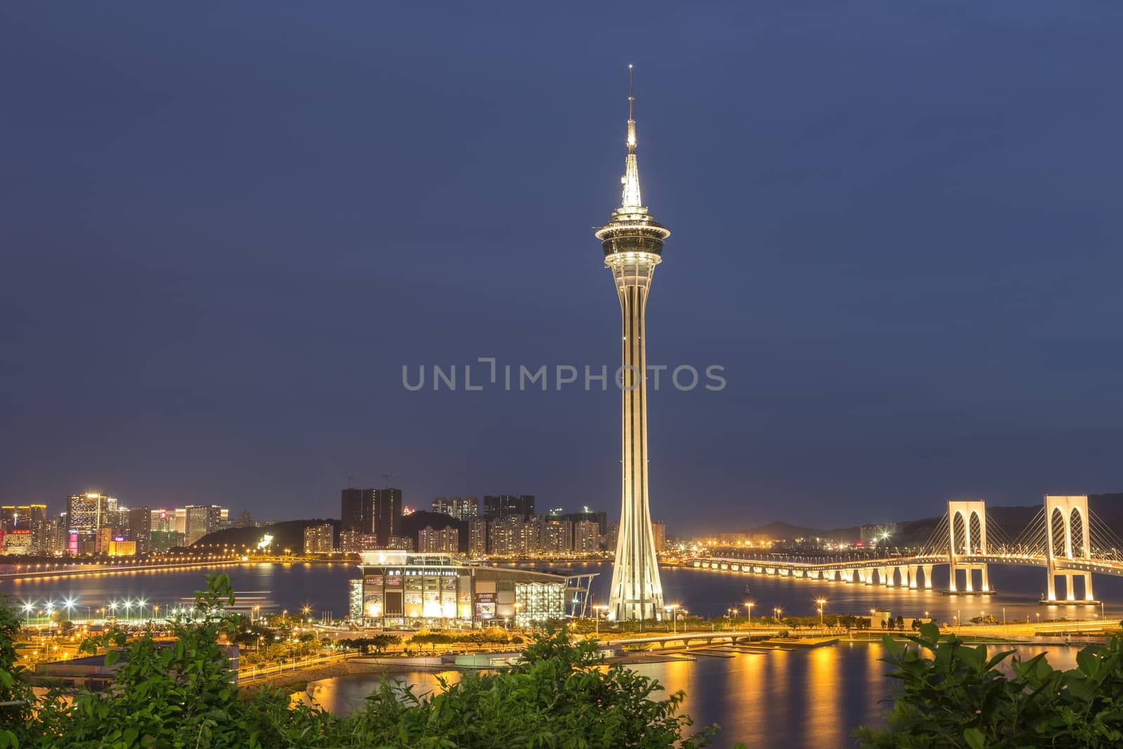 Macau Tower and Ponte de Sai Van bridge, This photo was shot in the evening after sunset.