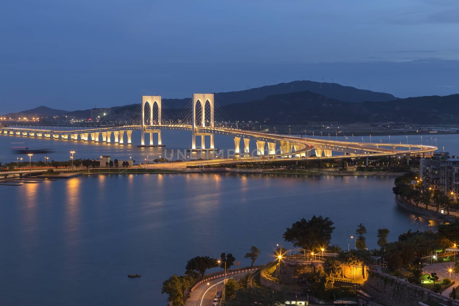 Macau Tower and Ponte de Sai Van bridge, This photo was shot in the evening after sunset.