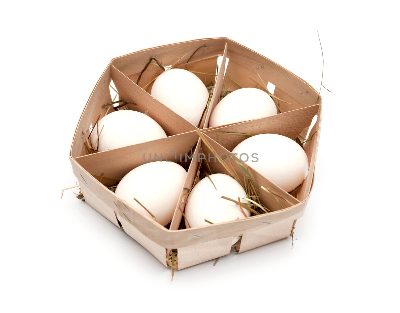 eggs in eco box. Isolated on white background. Top view.