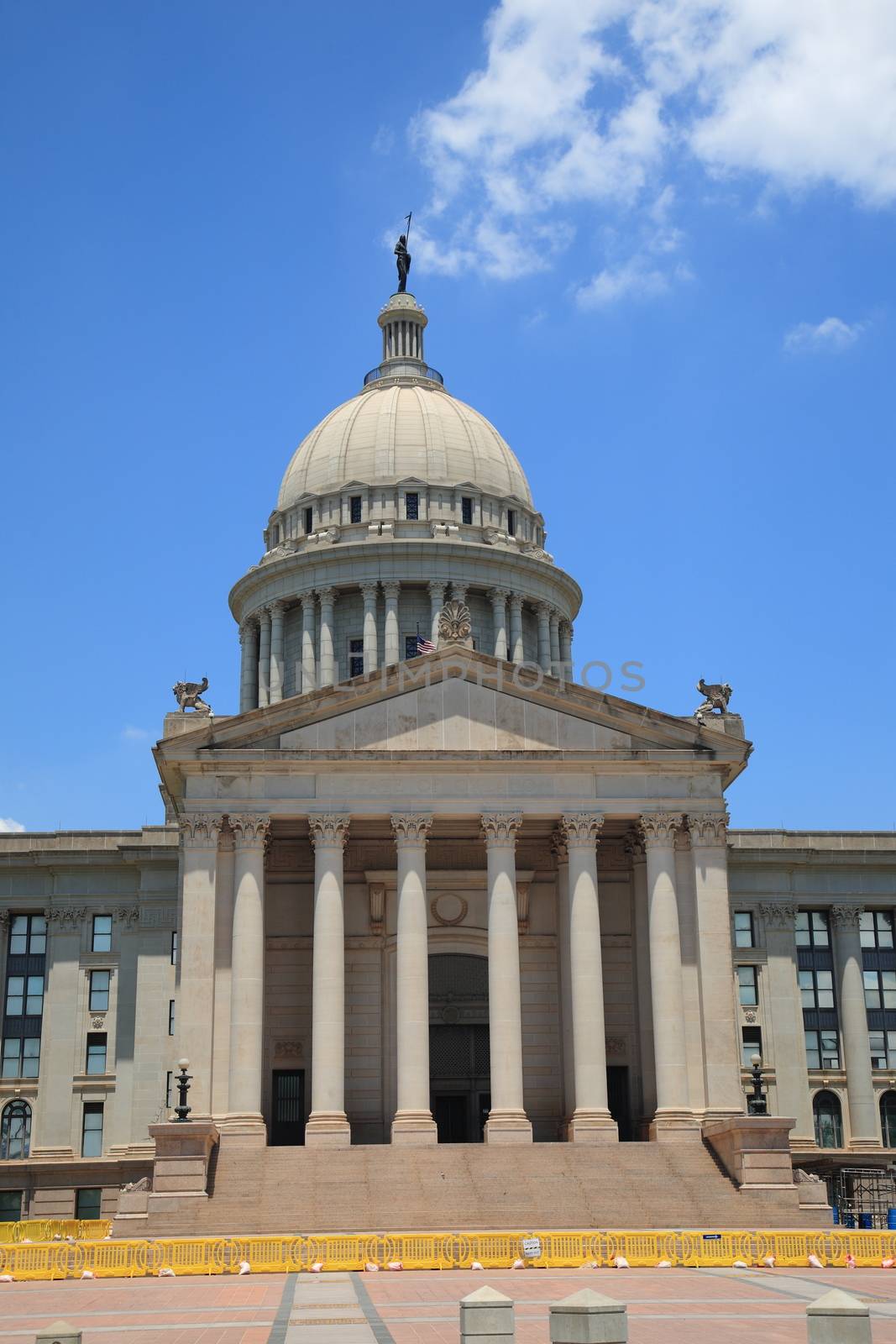 The state capitol building in Oklahoma City, with dome, stairs and columns.