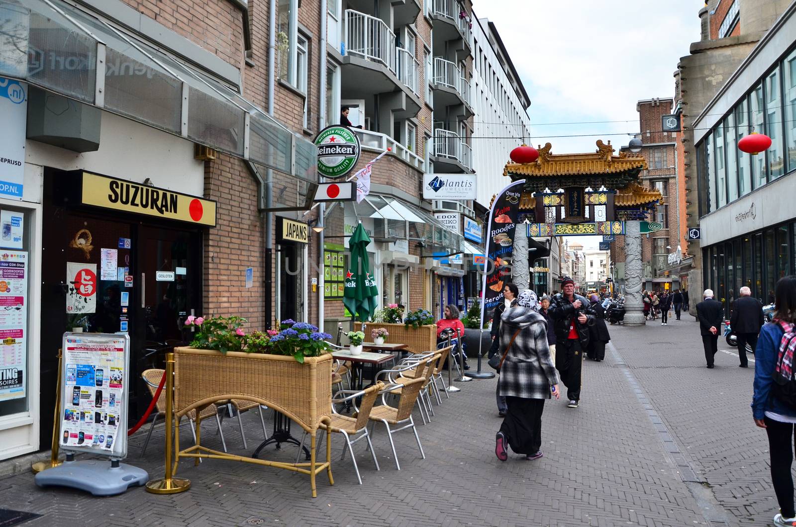 The Hague, Netherlands - May 8, 2015: People visit China town in The Hague. by siraanamwong