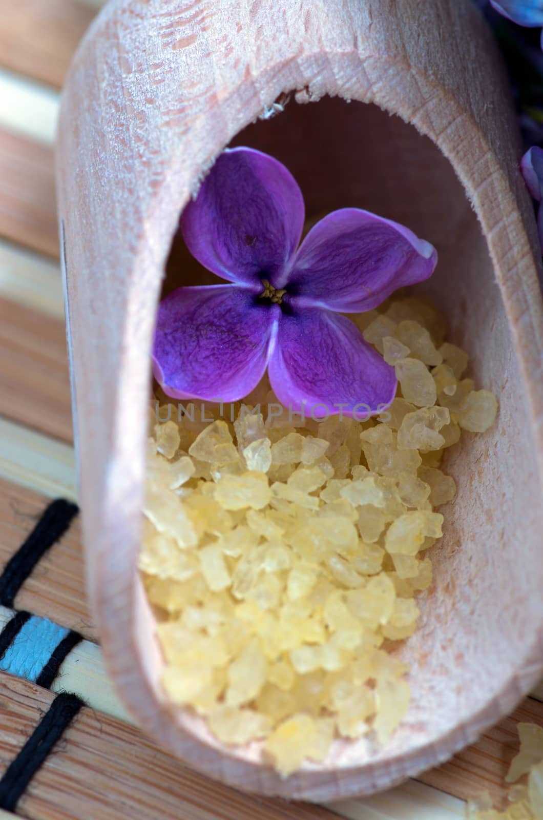 Flowers in a bowl color of brown with sea salt for SPA