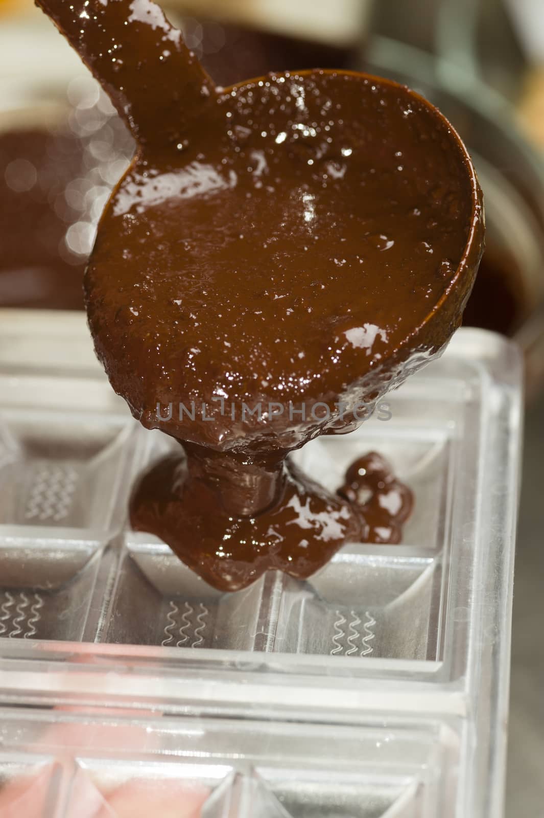 Mixed chocolate poured on bar mold