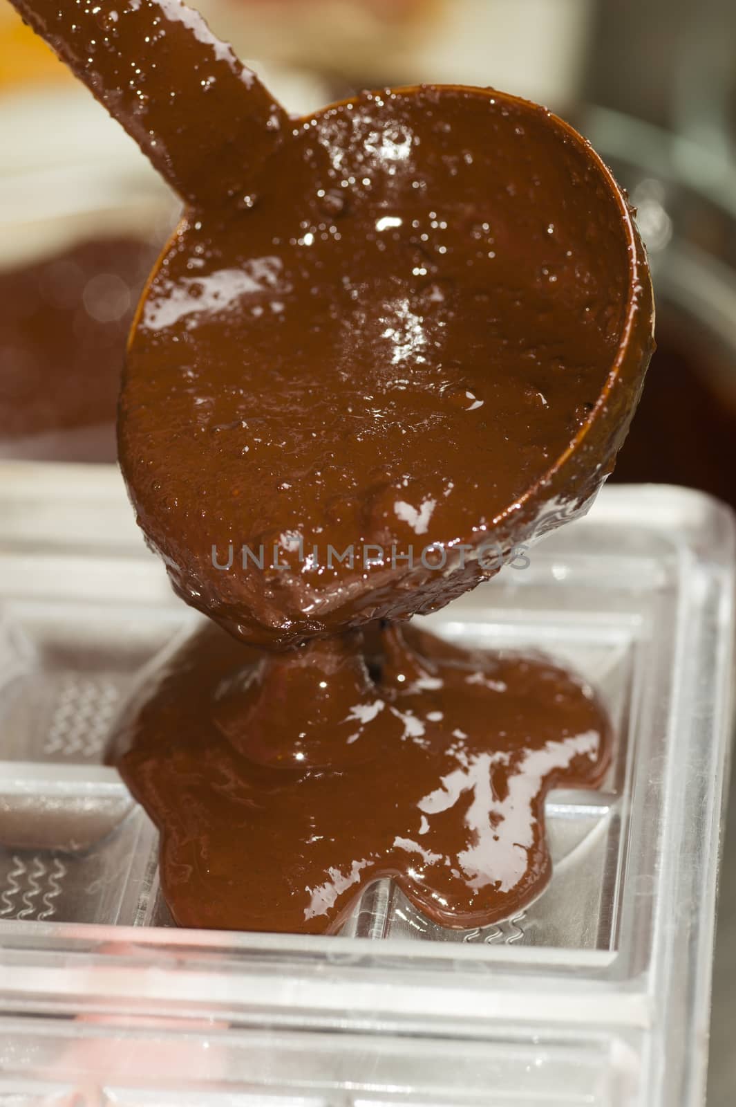 Mixed chocolate poured on bar mold
