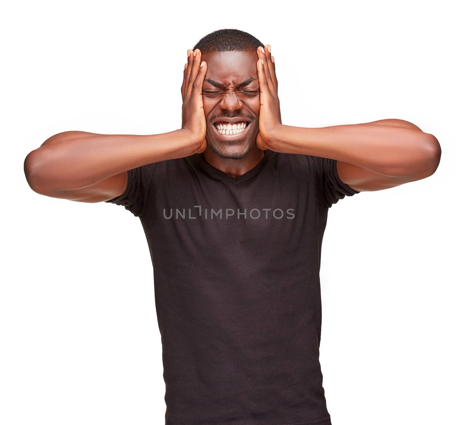Black man holding his head in pain and depression, isolated on white background