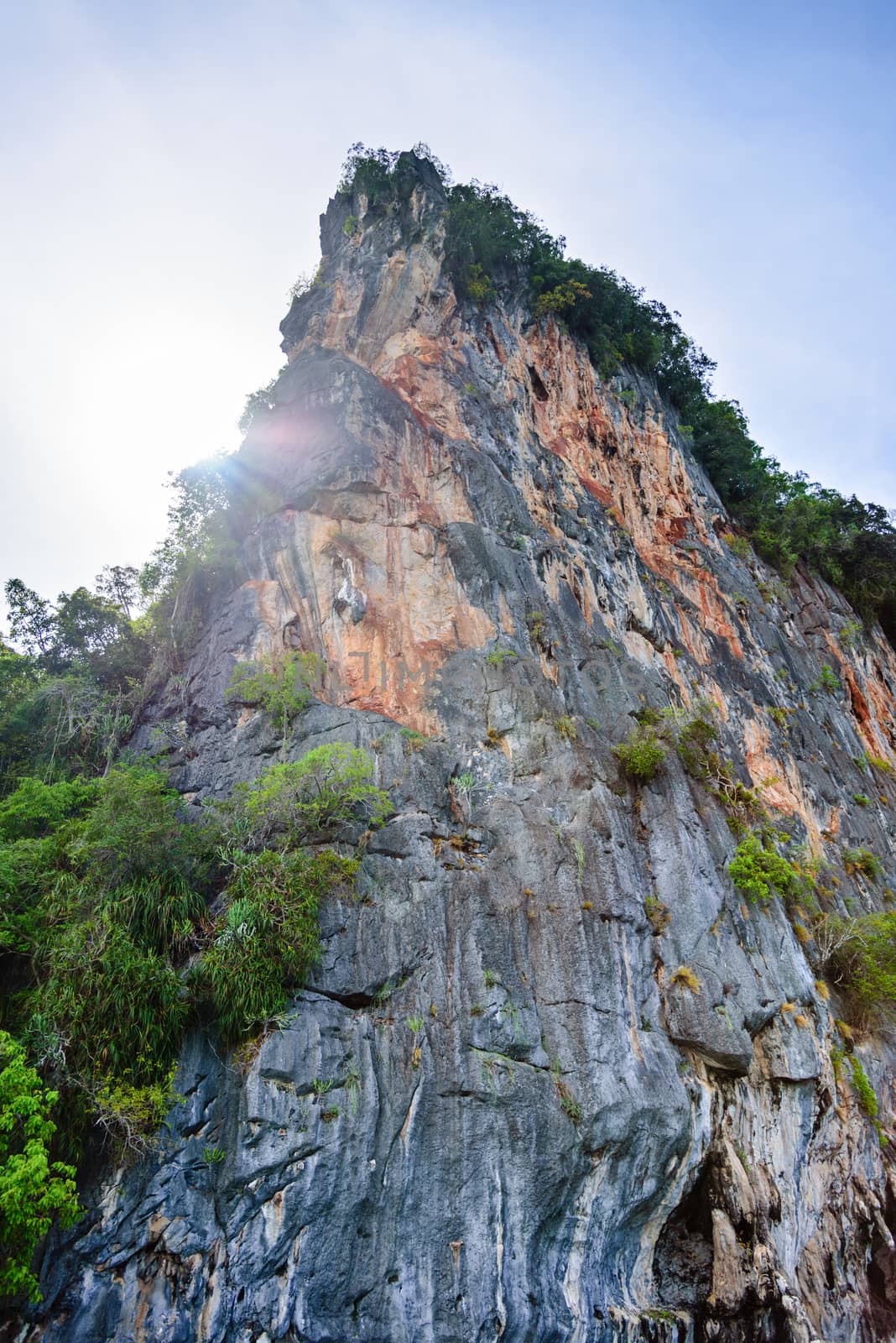 Colorful cliff and limestone mountain peak under the sunlight of summer in Phang Nga Bay National Park, Thailand