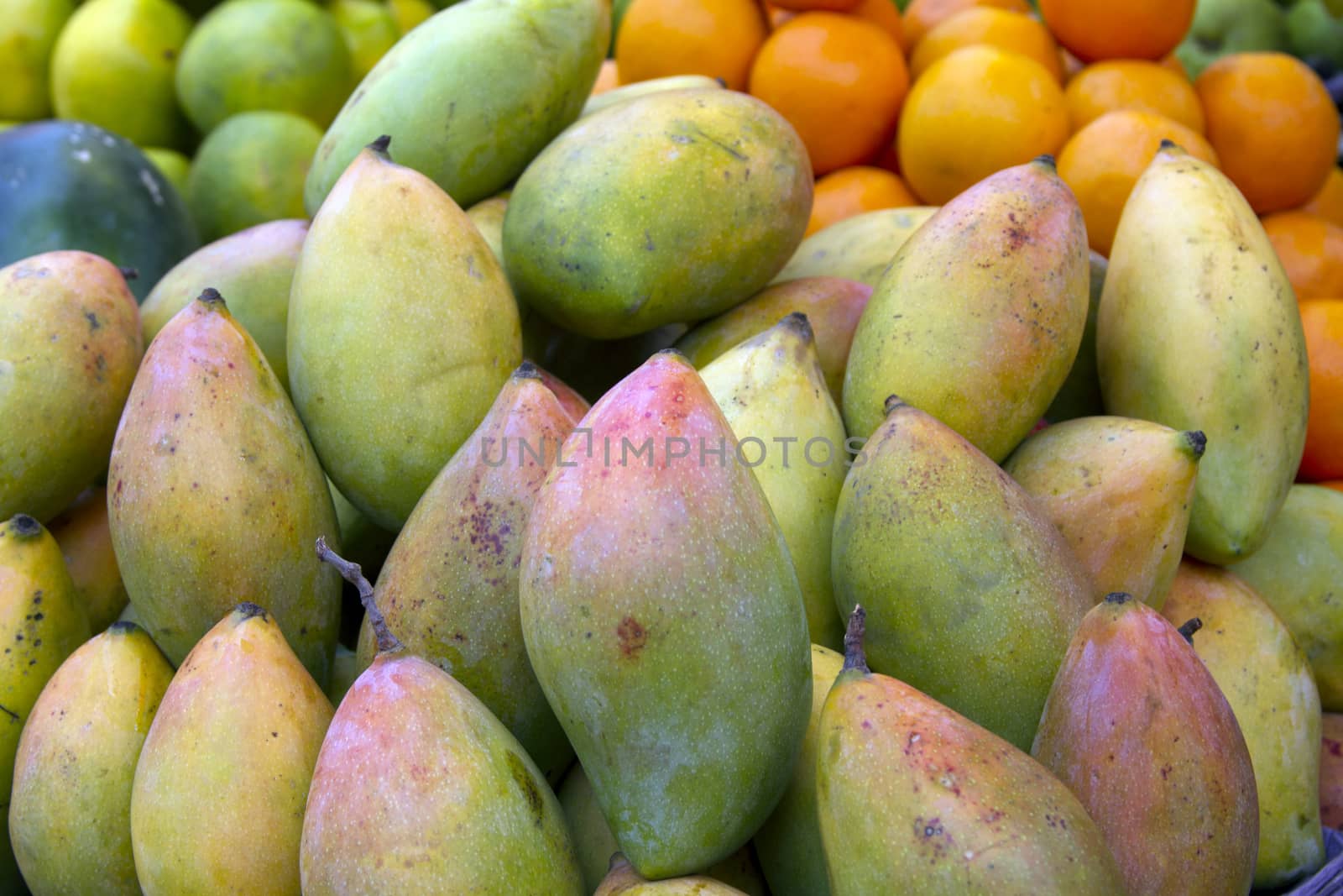 Fresh juicy mango on the market in India Goa by mcherevan