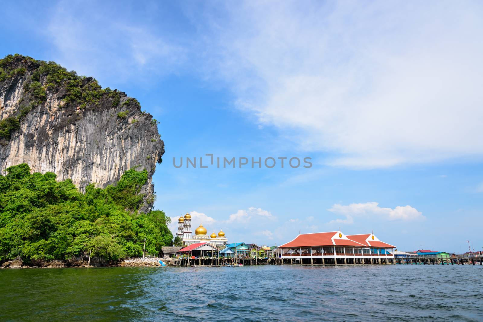 Beautiful landscape sea and blue sky in summer at Punyi Island or Koh Panyee is fisherman village cultural attractions travel by boat in Phang Nga Bay or Ao Phang Nga National Park, Thailand