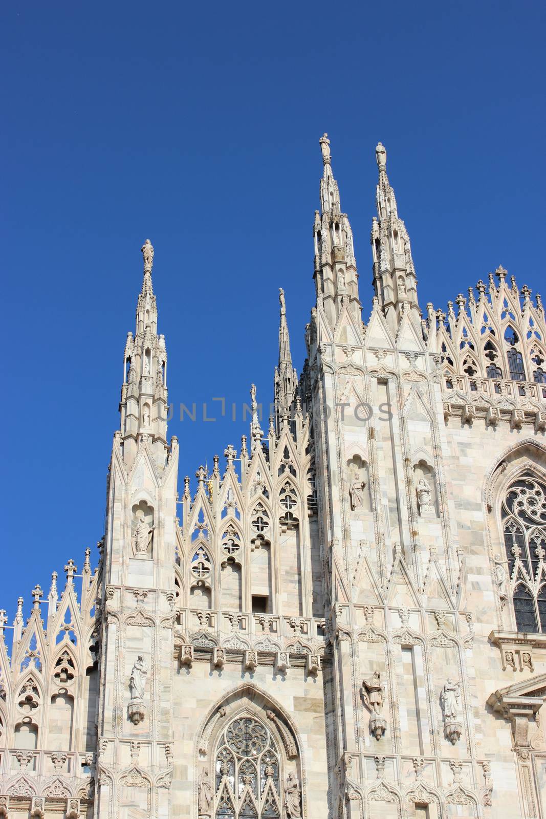 Milan Cathedral with a beautiful blue sky by bensib