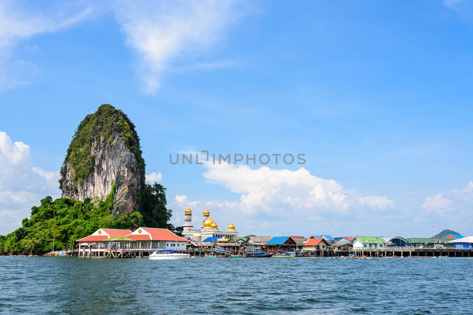 Beautiful landscape sea and blue sky in summer at Punyi Island or Koh Panyee is fisherman village cultural attractions travel by boat in Phang Nga Bay or Ao Phang Nga National Park, Thailand