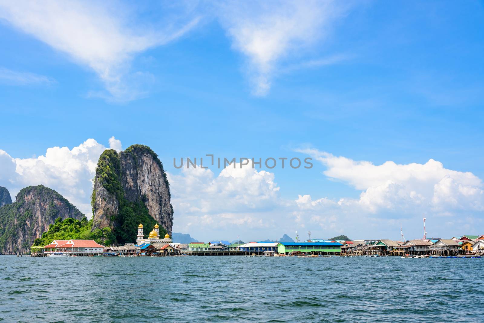 Beautiful landscape sea and blue sky in summer at Punyi Island or Koh Panyee is fisherman village cultural attractions travel by boat in Phang Nga Bay or Ao Phang Nga National Park, Thailand