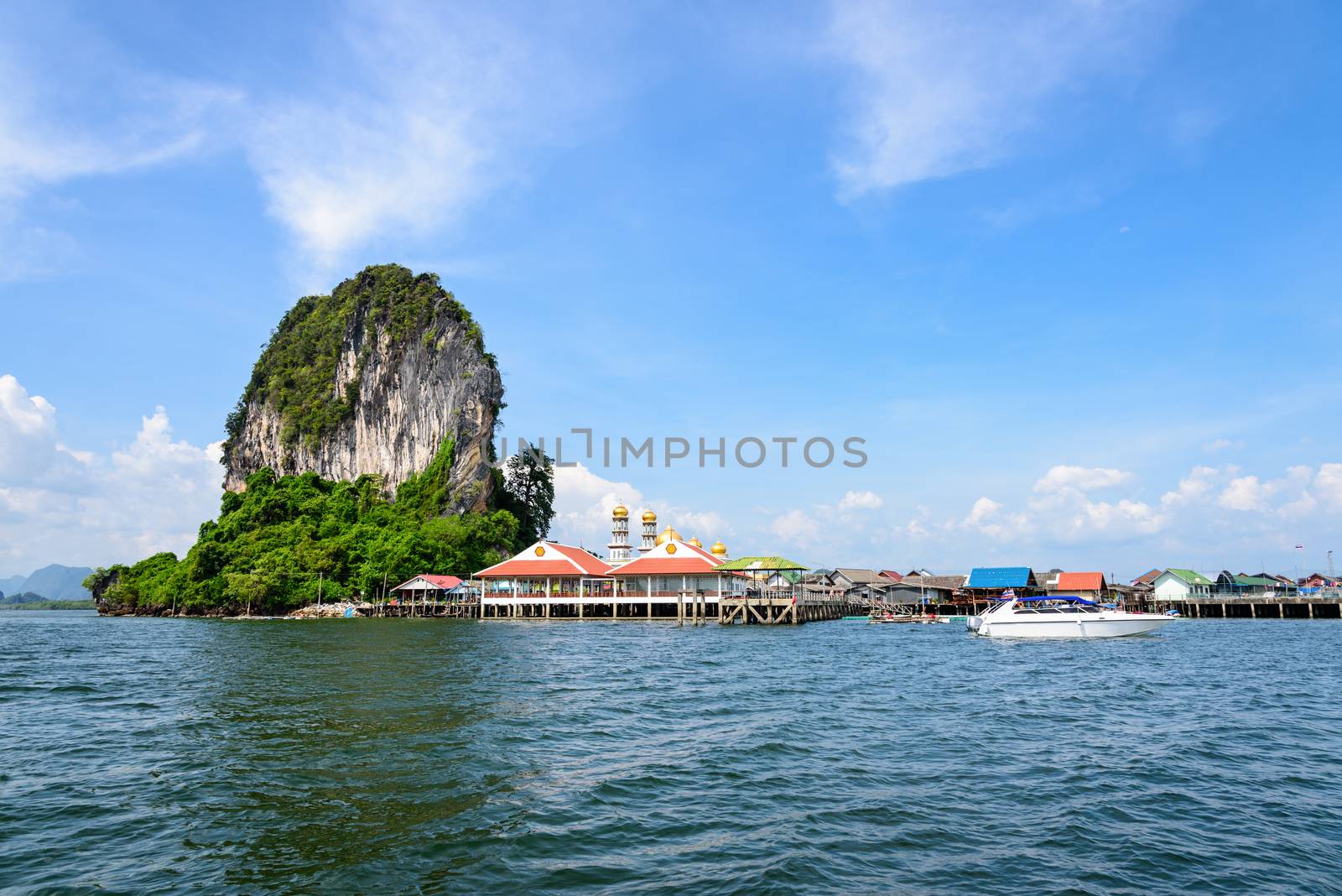 Beautiful landscape sea and blue sky in summer at Punyi Island or Koh Panyee is fisherman village cultural attractions travel by boat in Phang Nga Bay or Ao Phang Nga National Park, Thailand