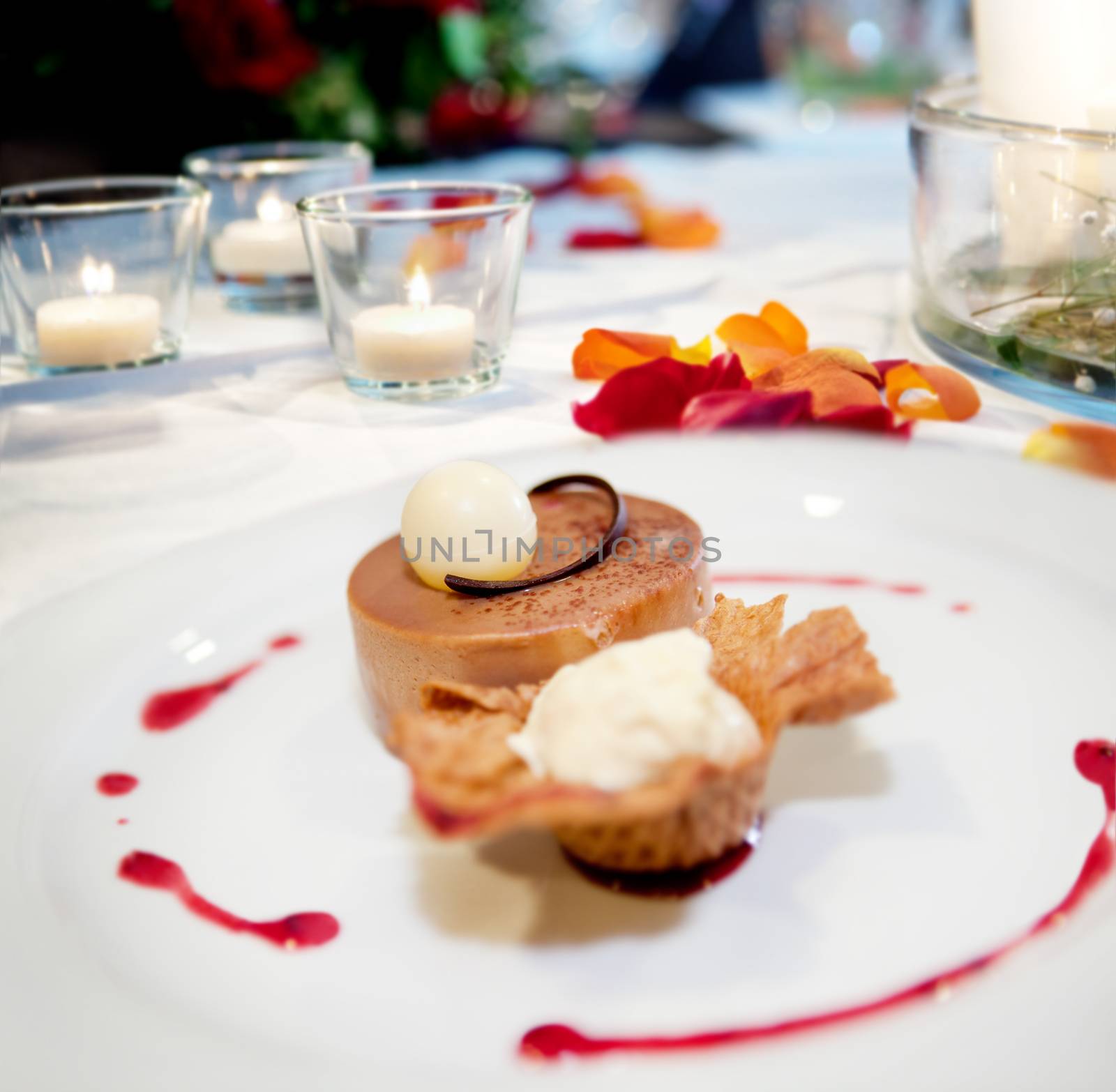 Dessert plate in restaurant. Cookie, ice cream and cake. Table background romantic restaurant. by Ainat