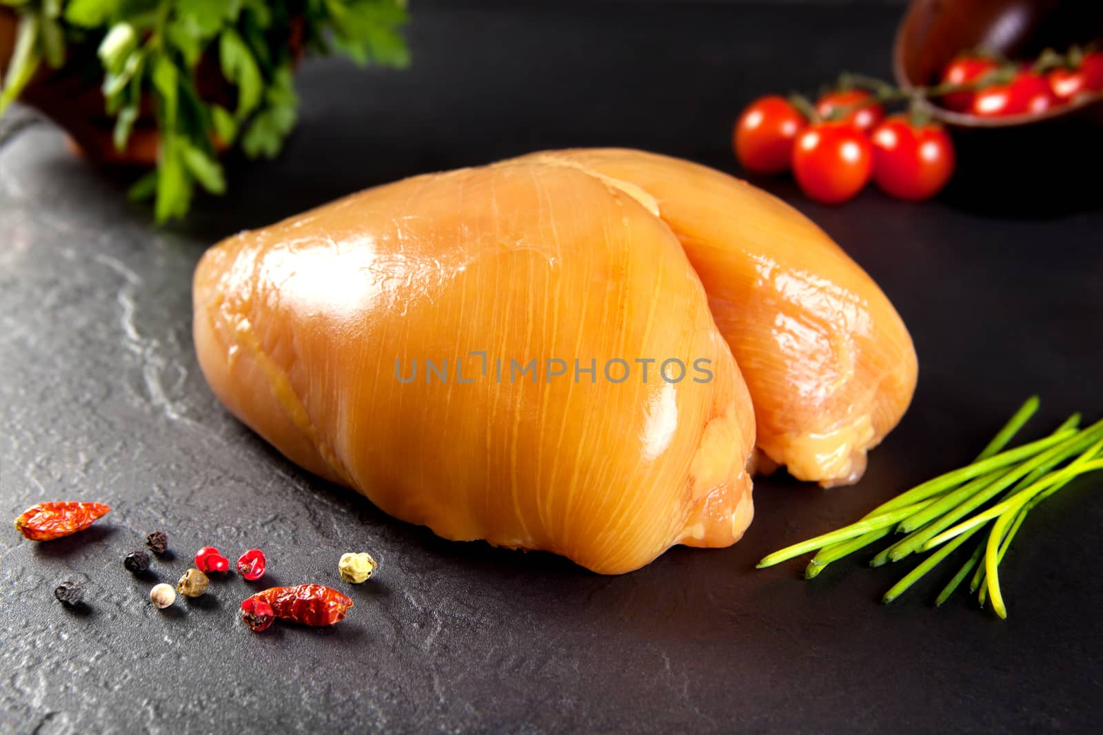 Raw and fresh meat. Whole chicken breast without cooking. Chicken birds fed yellow corn