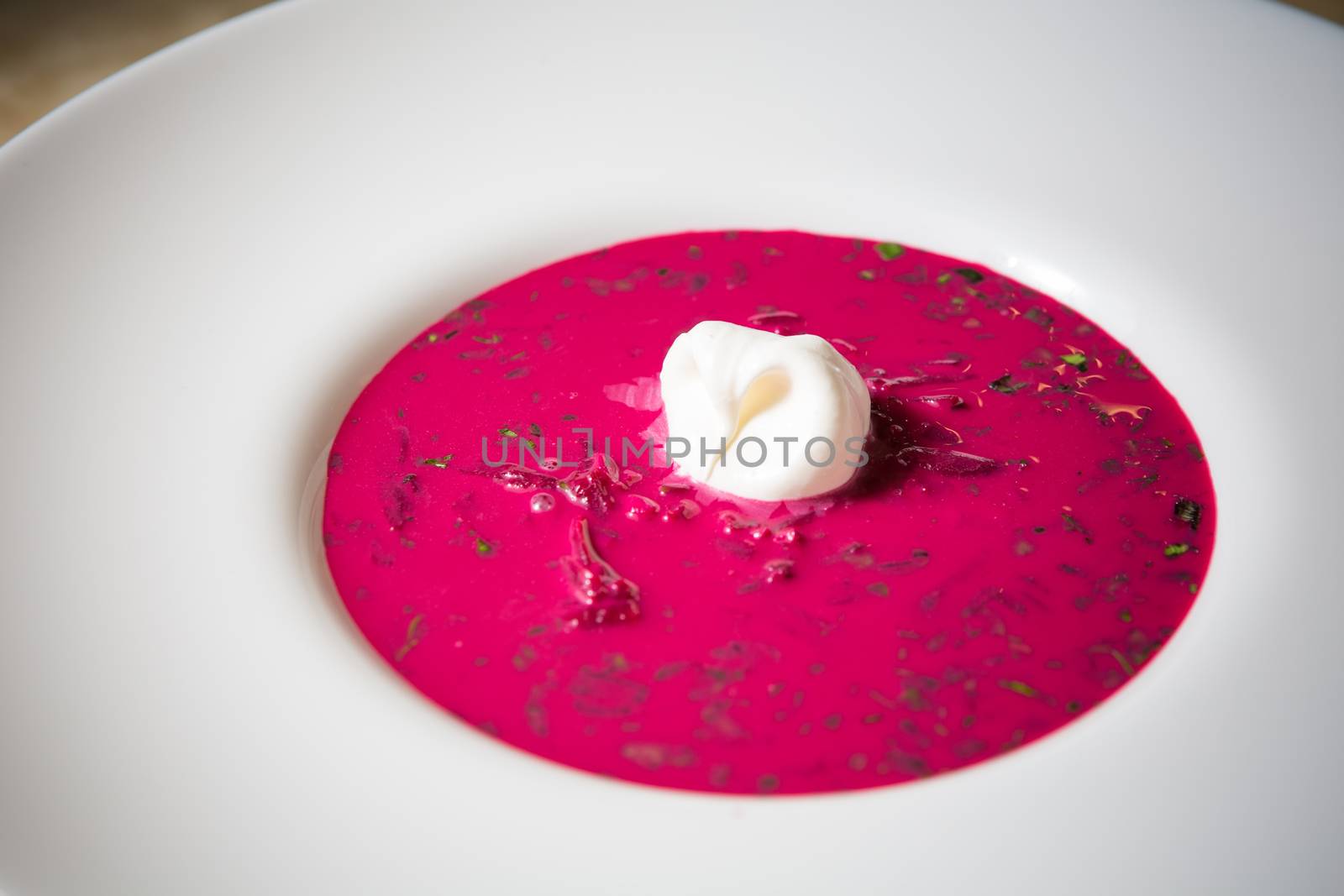 Cold summer Beets soup in white plate