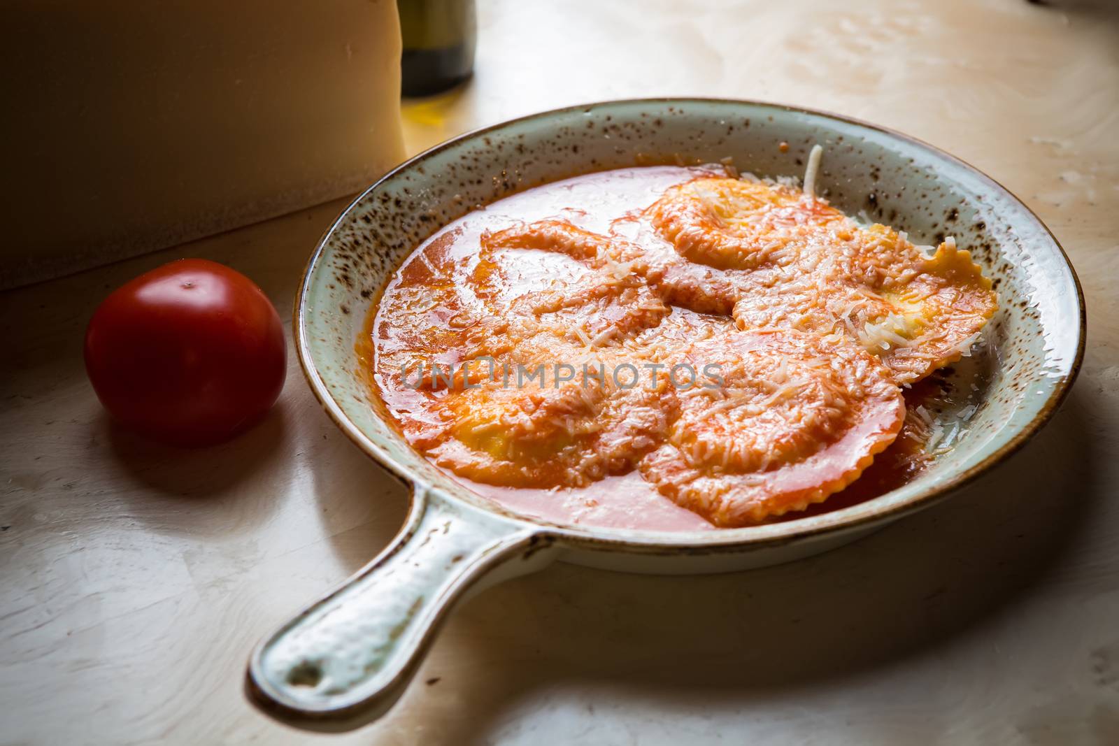Ravioli in sauce. Lunch. Ravioli Medallions with Marinara Sauce.